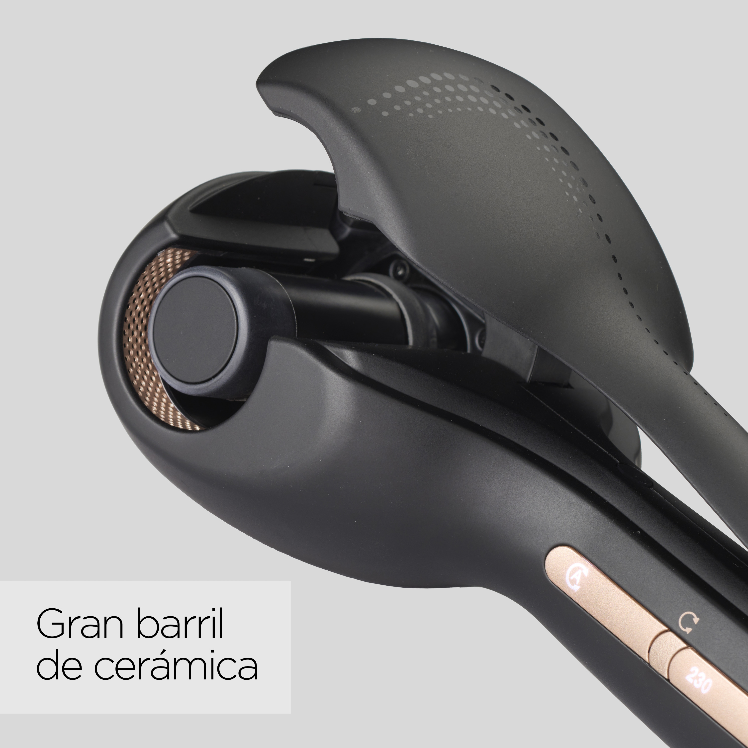 Rizador de pelo negro con un gran barril de cerámica, mostrando el elemento calefactor.
