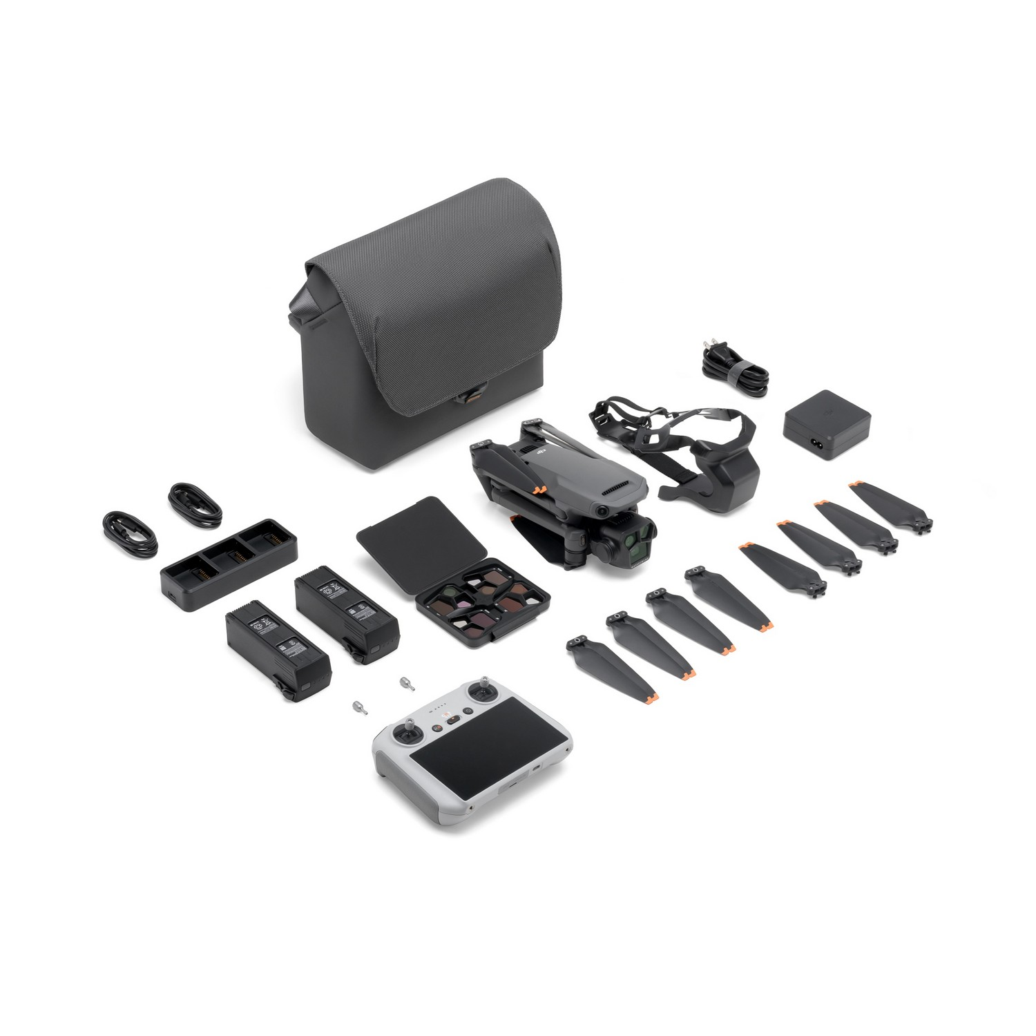 Drone kit with drone, remote, case, batteries, charger, propellers, and accessories.
