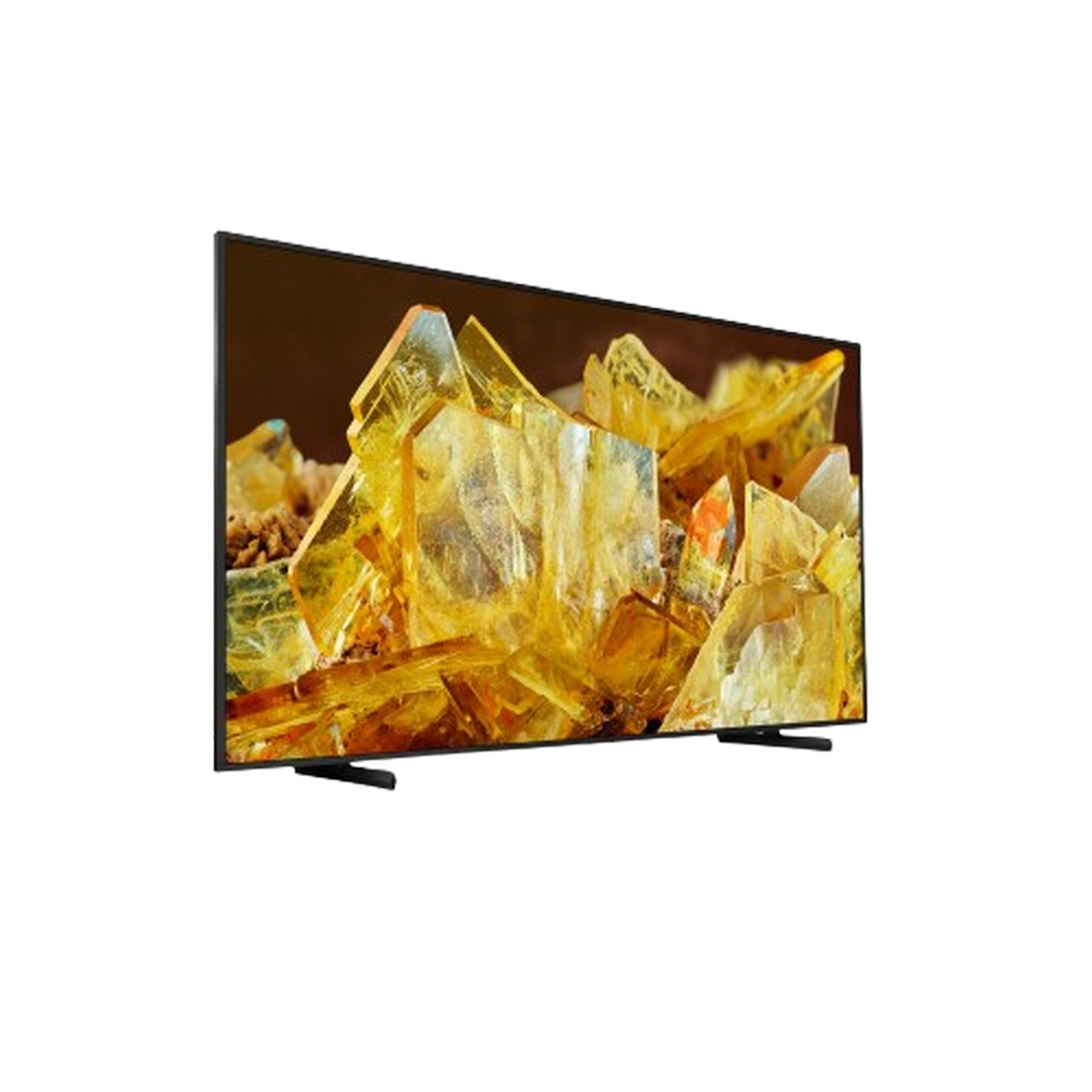 Een tv-scherm toont een close-up van een geel-oranje kristalstructuur tegen een bruine achtergrond.