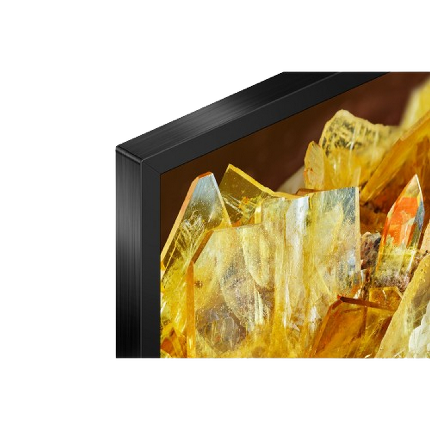 Close-up van een rand van een tv-scherm. Het heeft een zwart frame en een gouden kristalafbeelding.