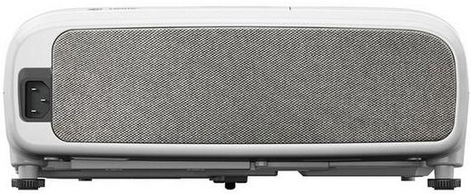 Biały projektor z szarą kratką i wejściem zasilania, widok z tyłu.