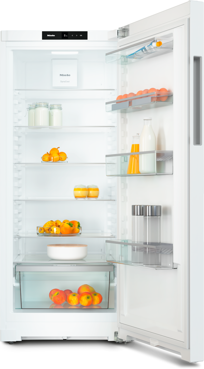 Offener Miele Kühlschrank mit Eiern, Milch, Saft, Obst und Gemüse.