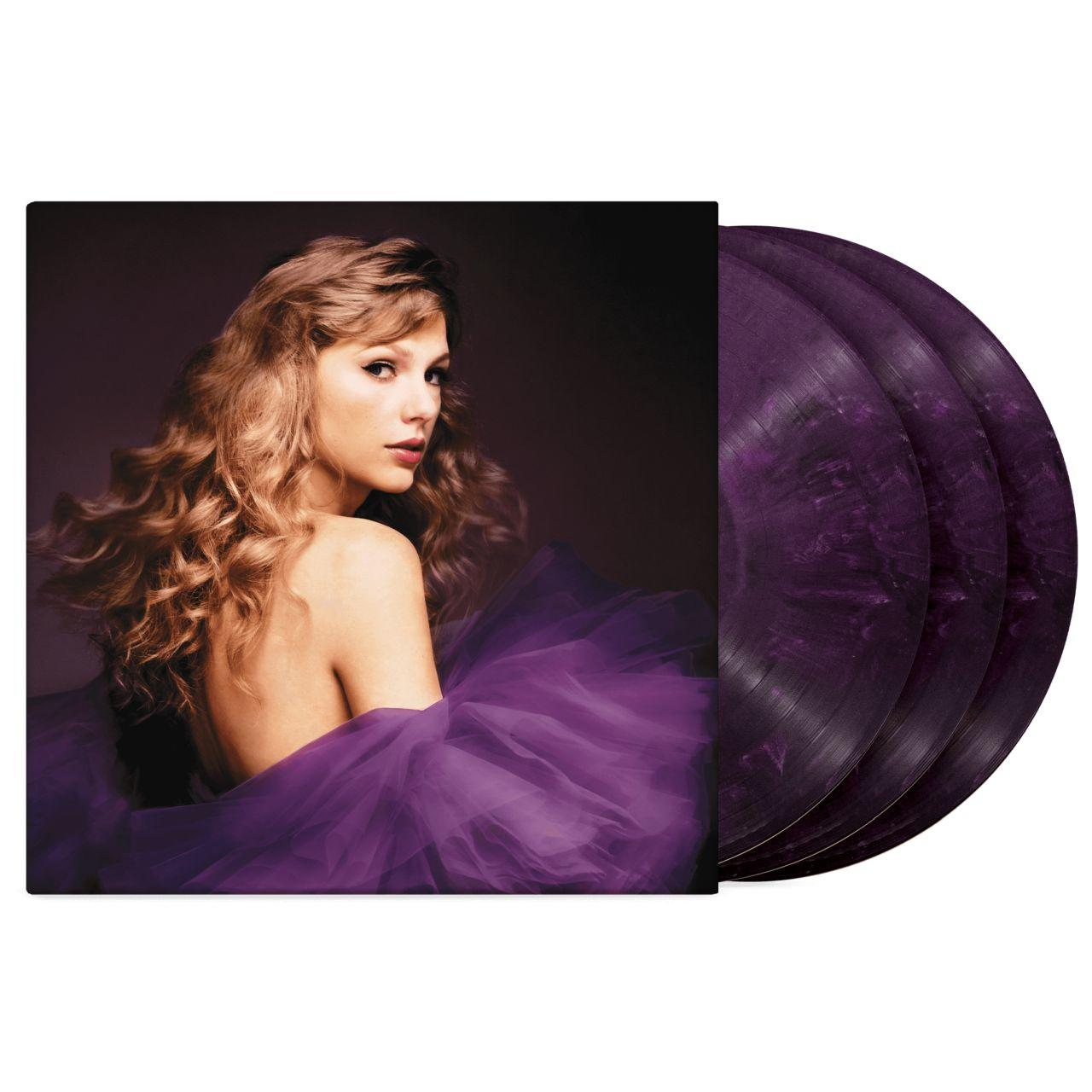 Taylor Swift Albumcover mit Gesicht und lila Kleid. Drei lila Vinyl-Schallplatten sind sichtbar.