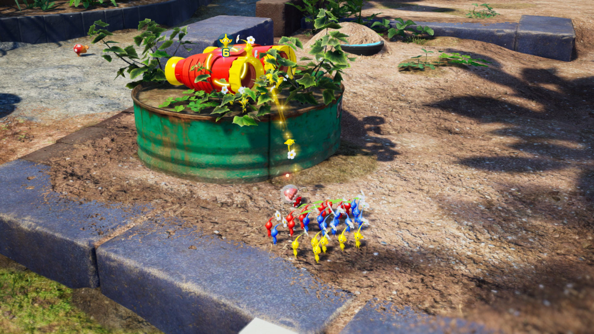 Videospielszenen: Figuren in einem Garten, Fass mit Pflanzen und Kanone.