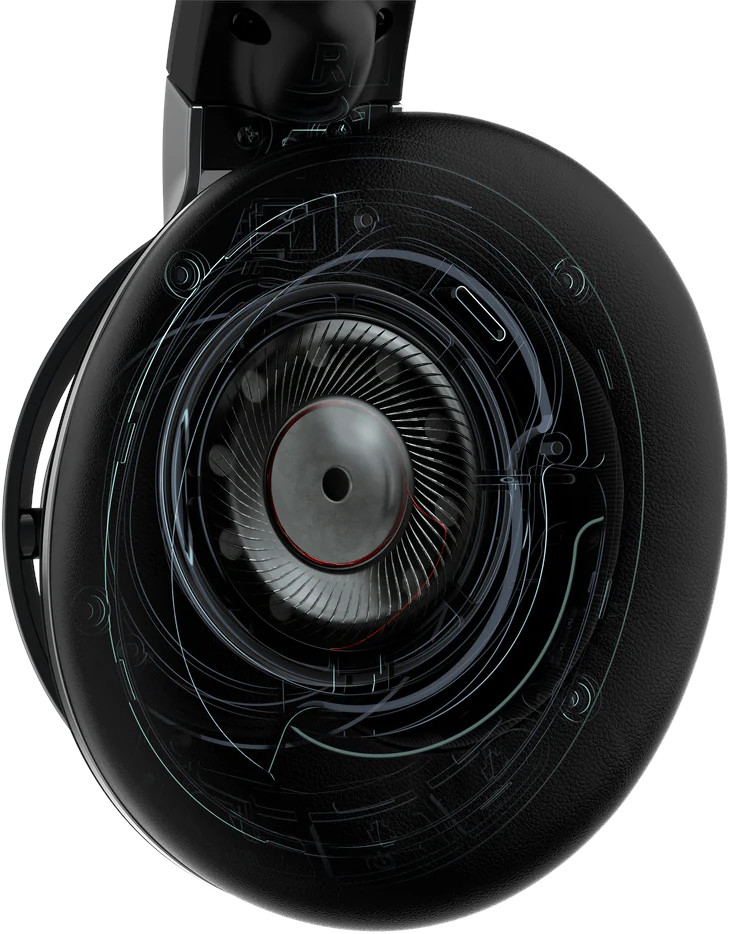 Gros plan sur un haut-parleur de casque montrant le fonctionnement interne. Noir et détaillé.
