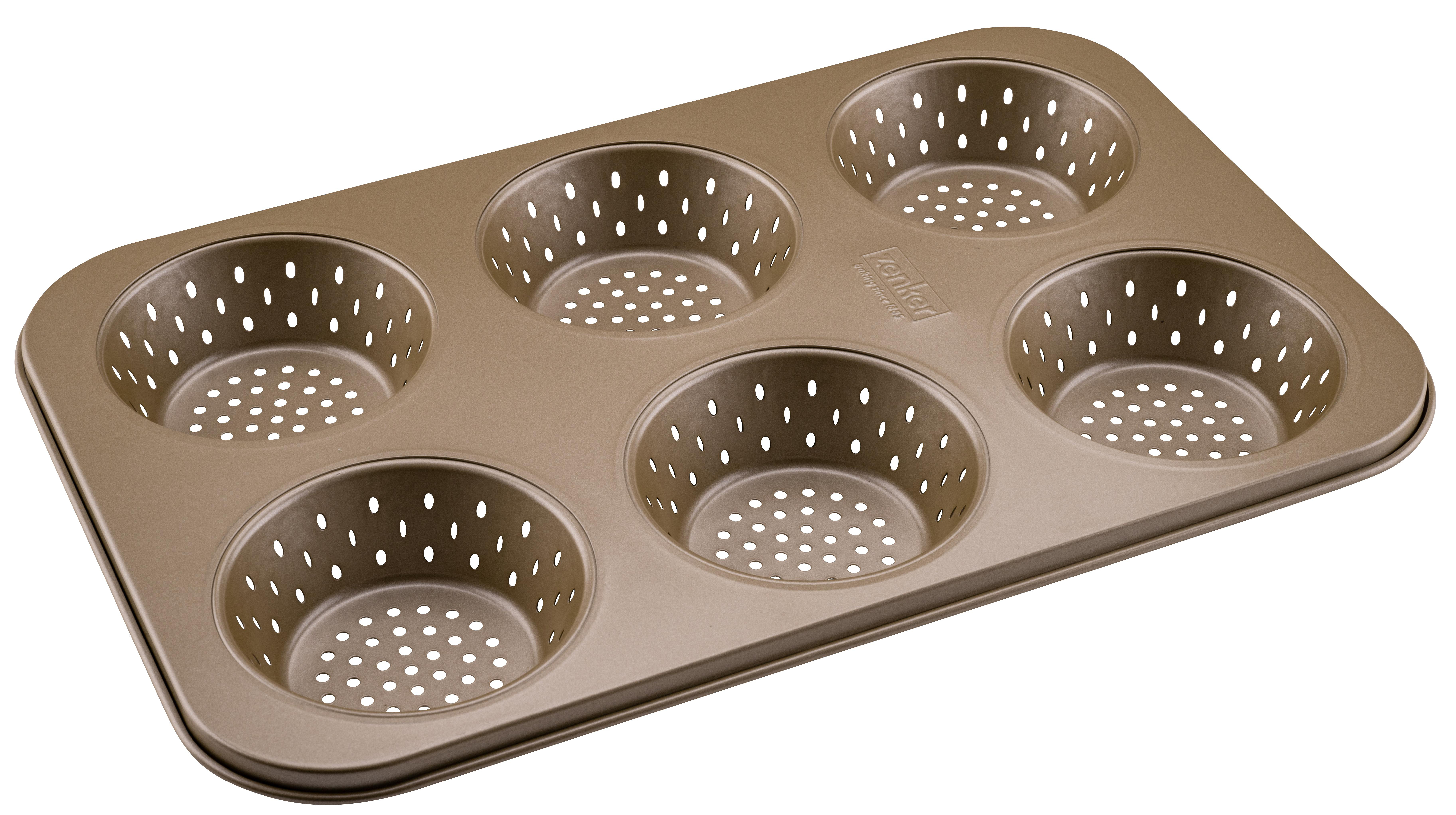 Eine bronzefarbene Muffinform mit sechs kreisförmigen Formen.