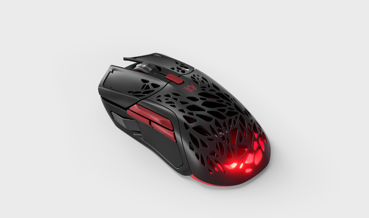 Ratón gaming negro y rojo con diseño. Luces rojas iluminan la base.