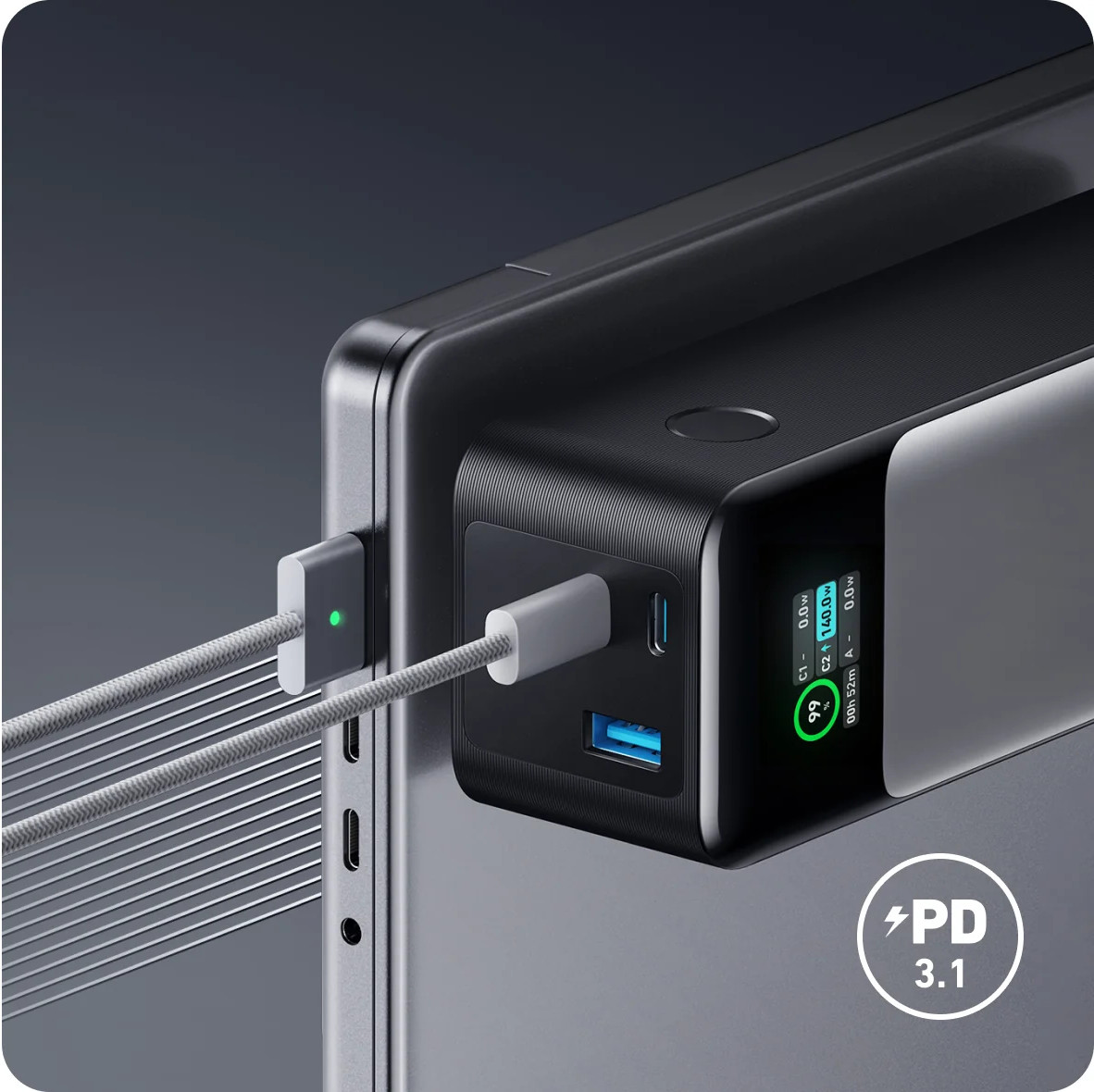 A black power bank connected to a laptop with a USB-C cable. Power bank has a screen.