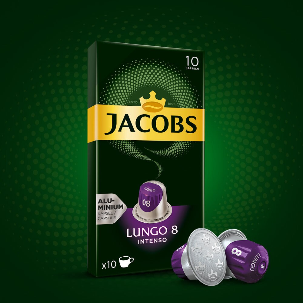 Kapsułki do kawy Jacobs w pudełku, z zielonym tłem i kapsułkami na zewnątrz.