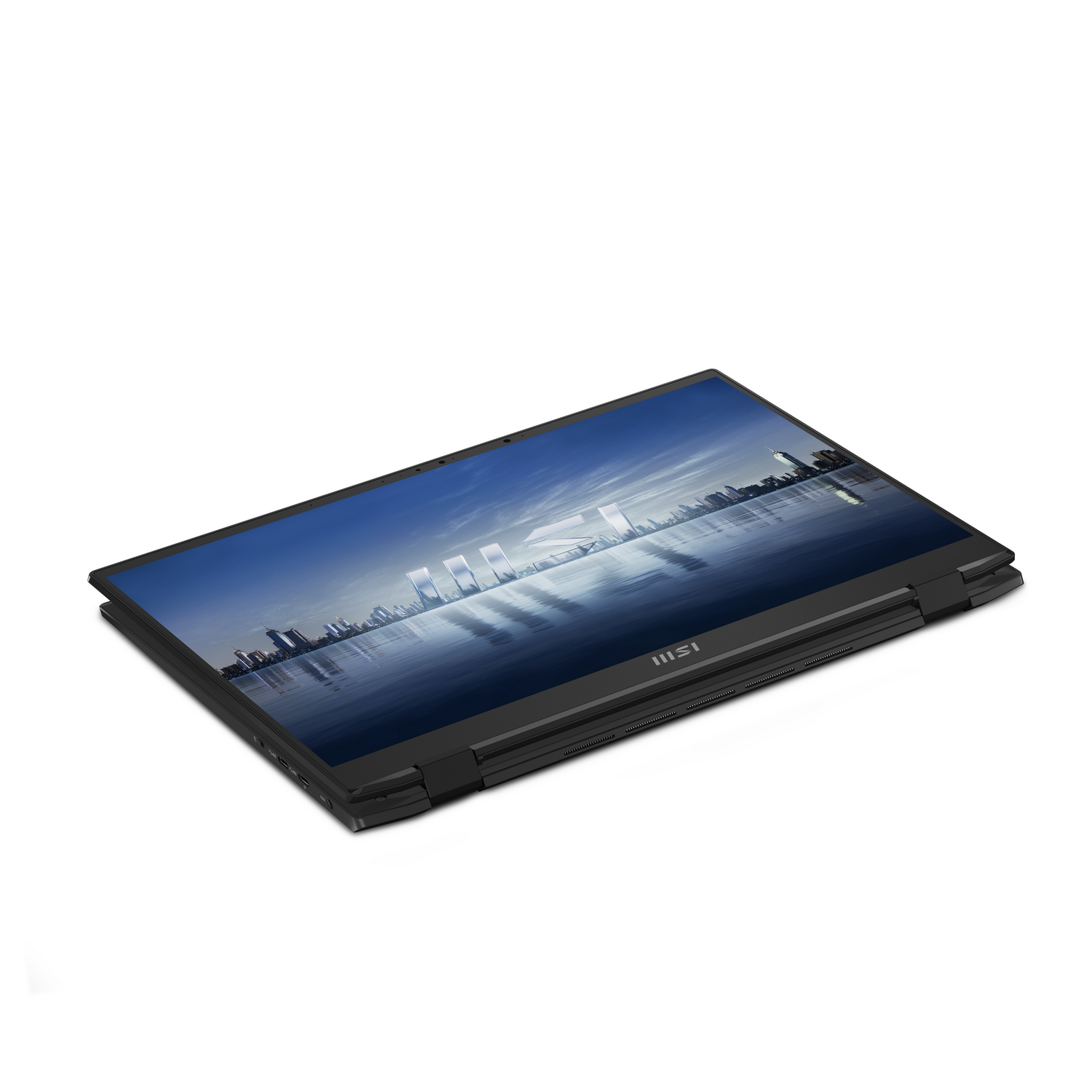 Una laptop negra está abierta, mostrando una escena de horizonte de la ciudad.