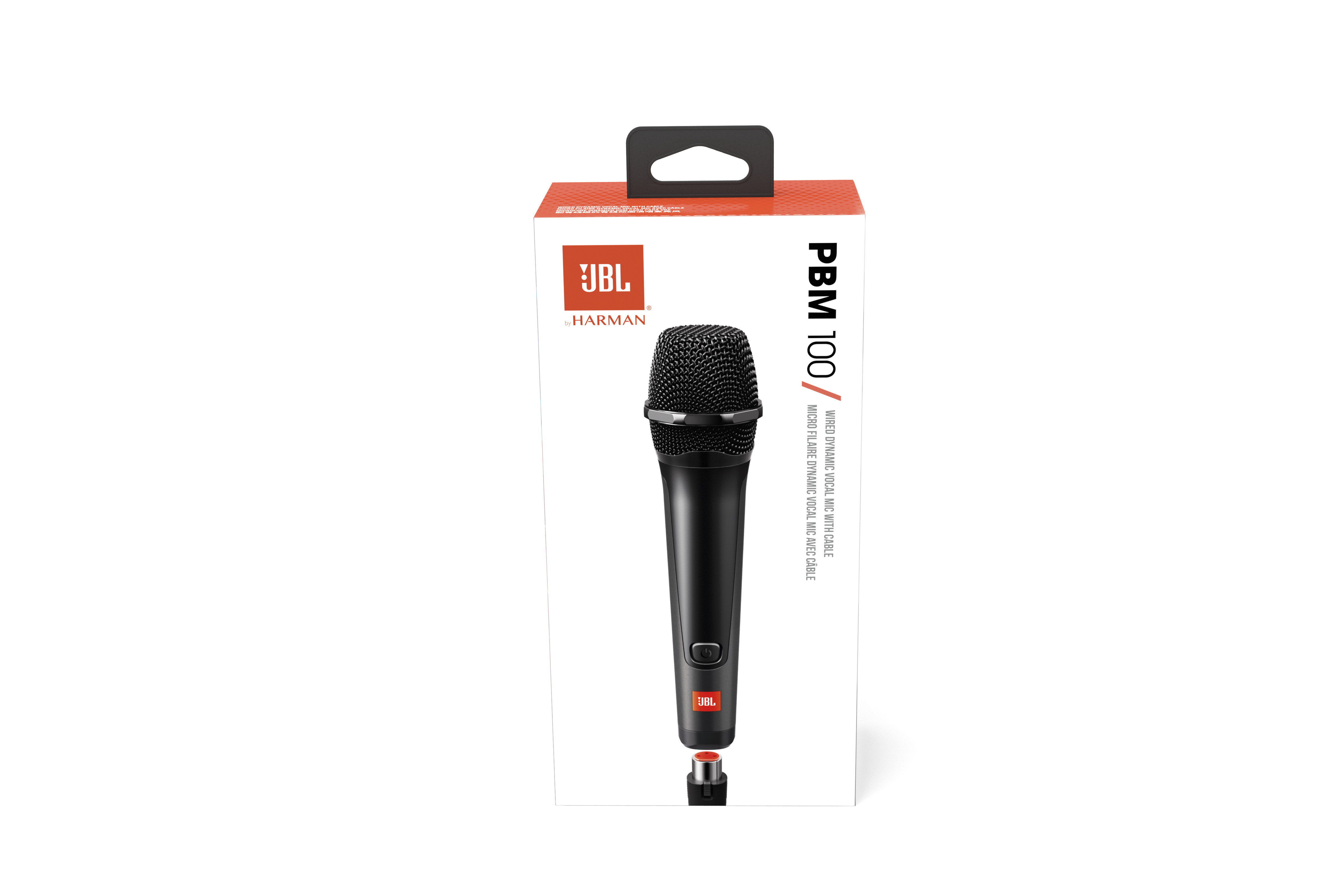 Un micrófono JBL negro en una caja blanca. La caja tiene marca roja y negra.