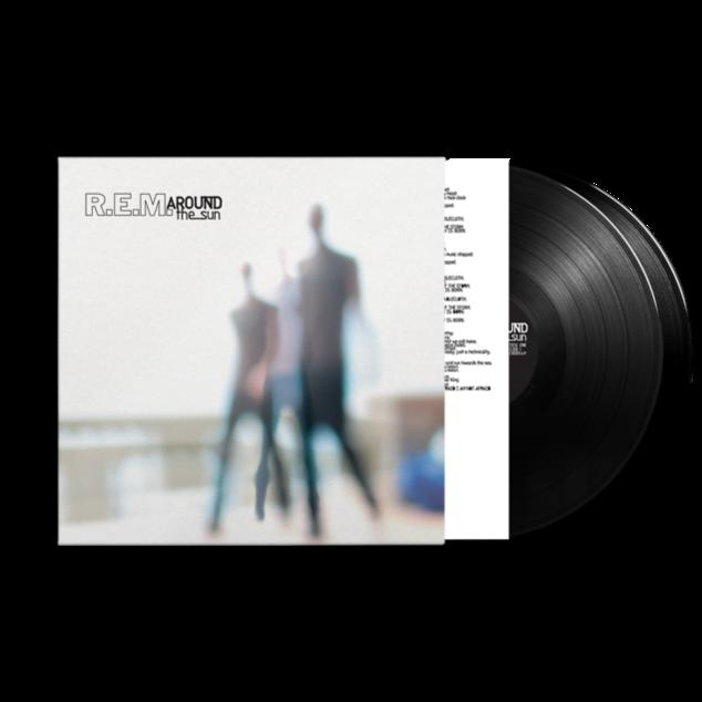 Egy bakelit lemez album borítója elmosódott sziluettekkel.