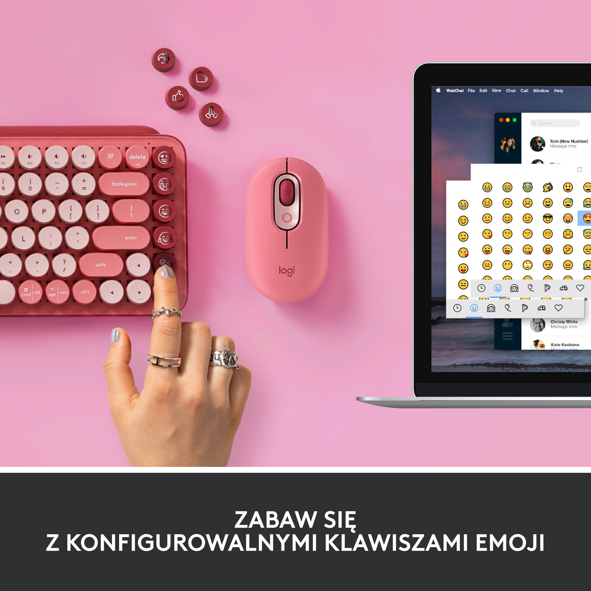 Ręka kobiety wchodząca w interakcję z różową klawiaturą i myszą, z widocznym ekranem emoji.