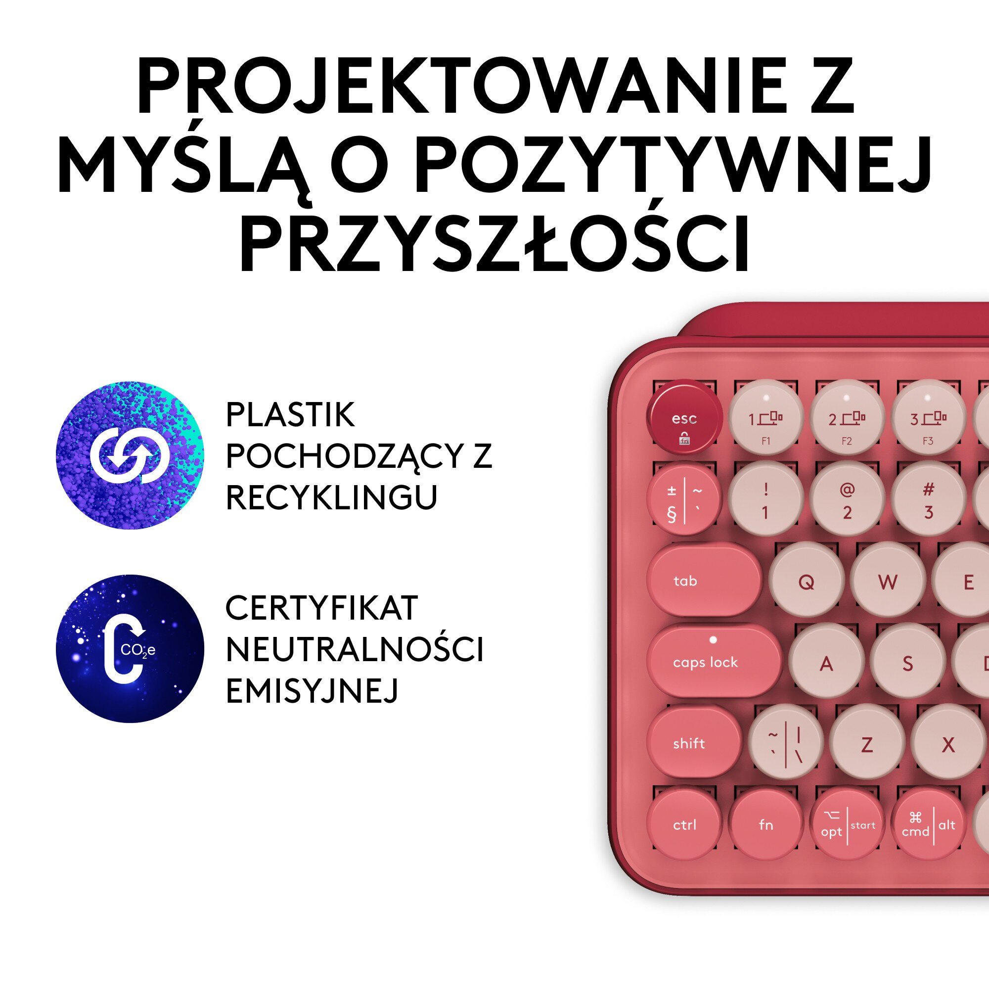 Różowa klawiatura z okrągłymi klawiszami i tekstem o plastiku z recyklingu i emisjach.