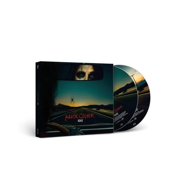 Album borító sivatagi úton haladó autóval és két CD-vel. Pók a szélvédőn.