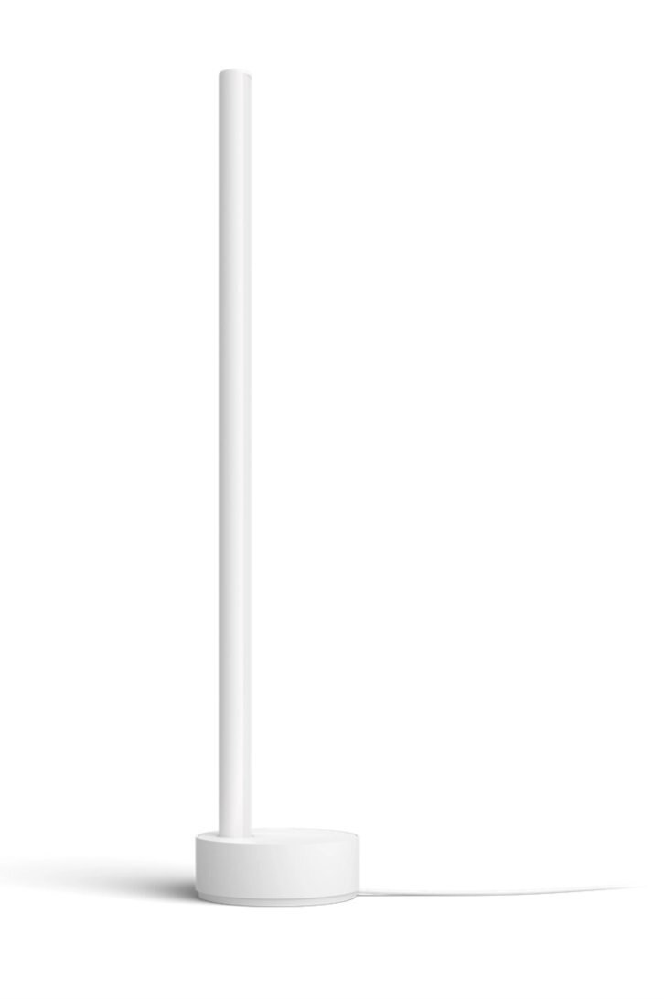 Biała, minimalistyczna lampa podłogowa z cylindryczną podstawą i prostym słupem.