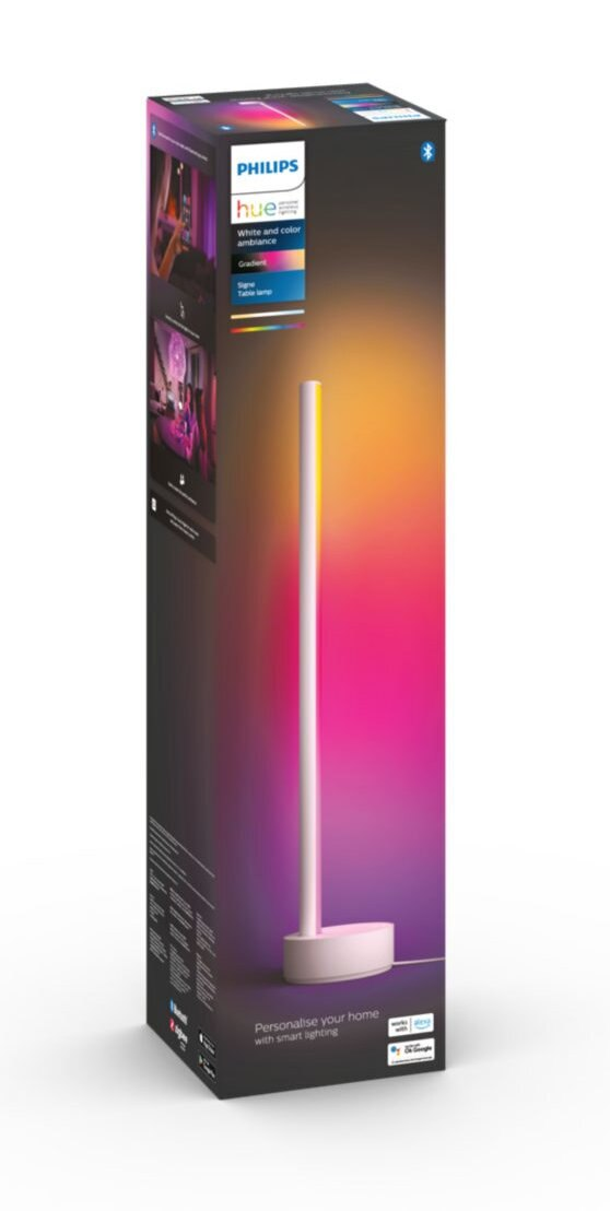 Wysoka lampa Philips Hue w pudełku. Pudełko ma gradient kolorów, a światło jest białe.