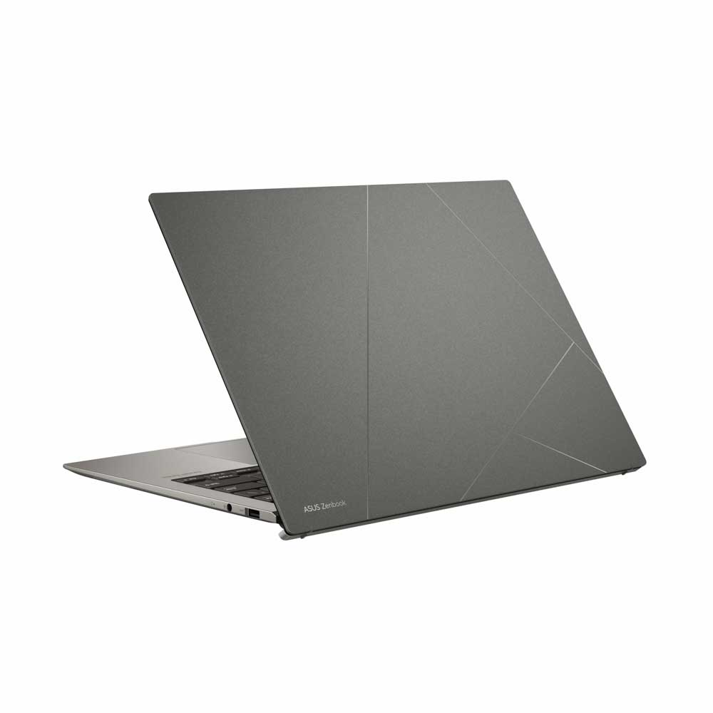 Beyaz arka plan üzerinde kapalı gri ASUS Zenbook dizüstü bilgisayar.