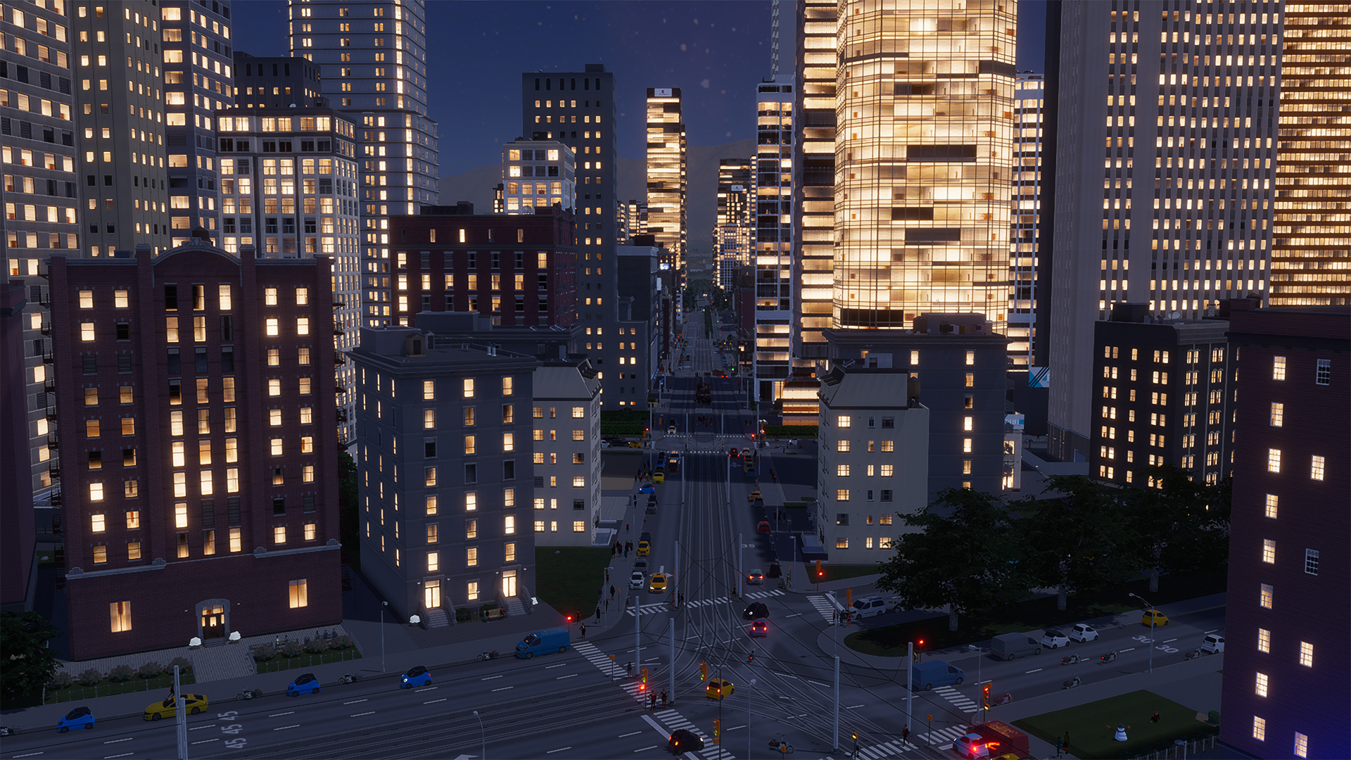 Eine nächtliche Stadtlandschaft mit beleuchteten Gebäuden und Straßenlaternen.