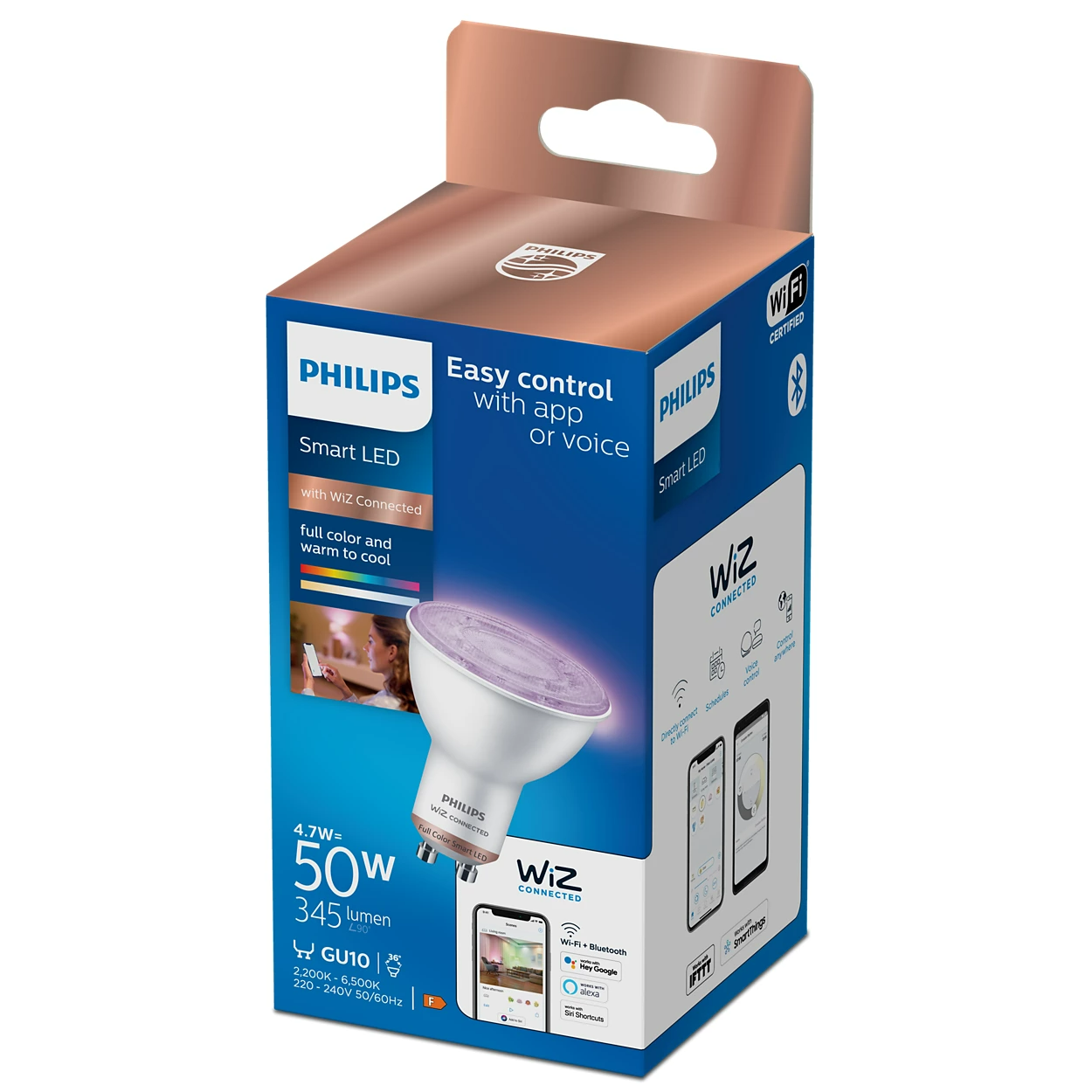 Egy Philips okos LED izzó egy dobozban, a termék az asztalon.