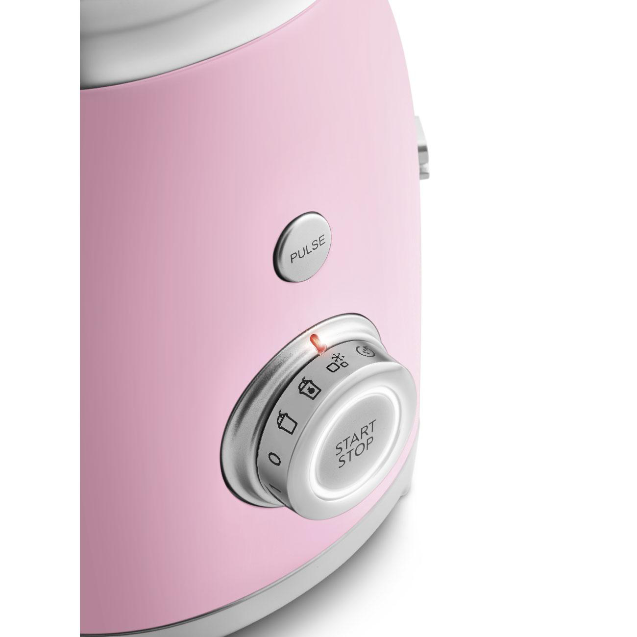 Nahaufnahme eines rosa Toasters mit Drehregler und Knopf.