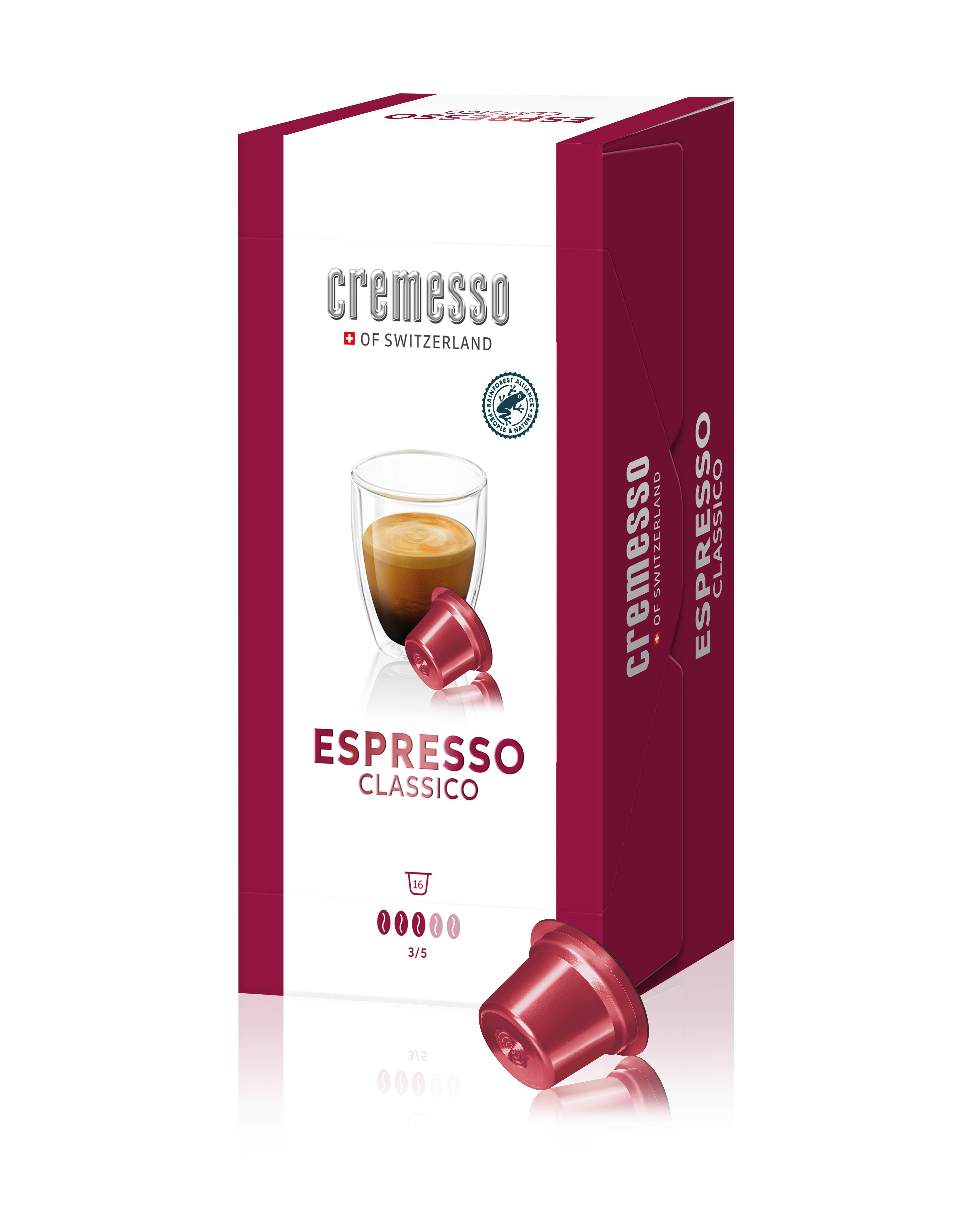Schachtel mit Espresso-Kapseln. Eine rote Kapsel und ein Kaffee sind sichtbar.