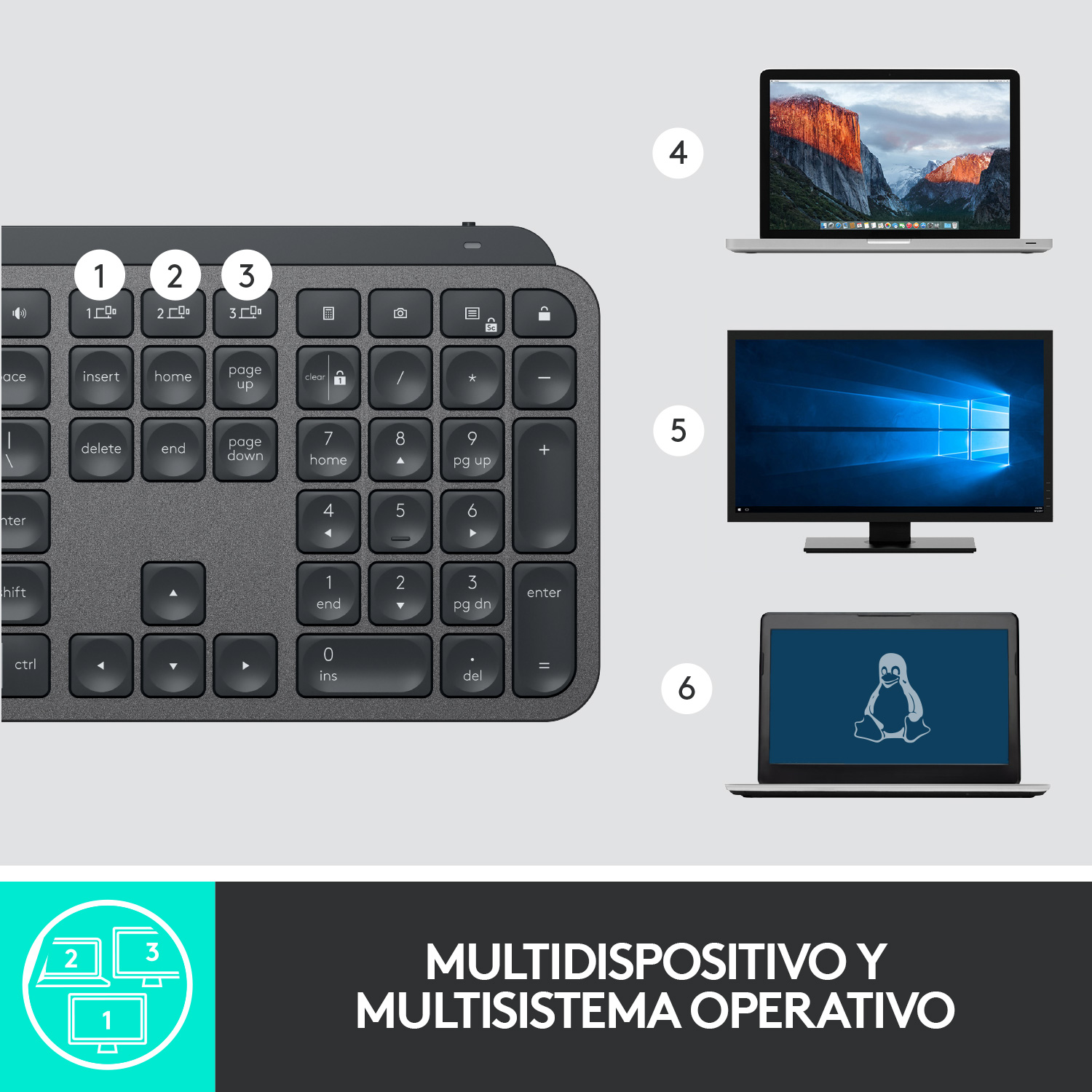 Un teclado con portátiles y monitores al fondo. El teclado está en primer plano.