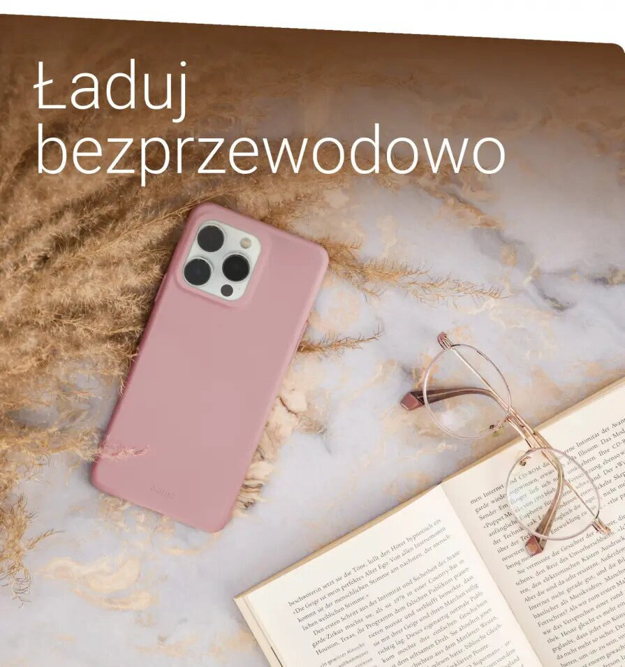 Różowe etui na telefon, okulary i książka z napisem 'ładuj bezprzewodowo'.