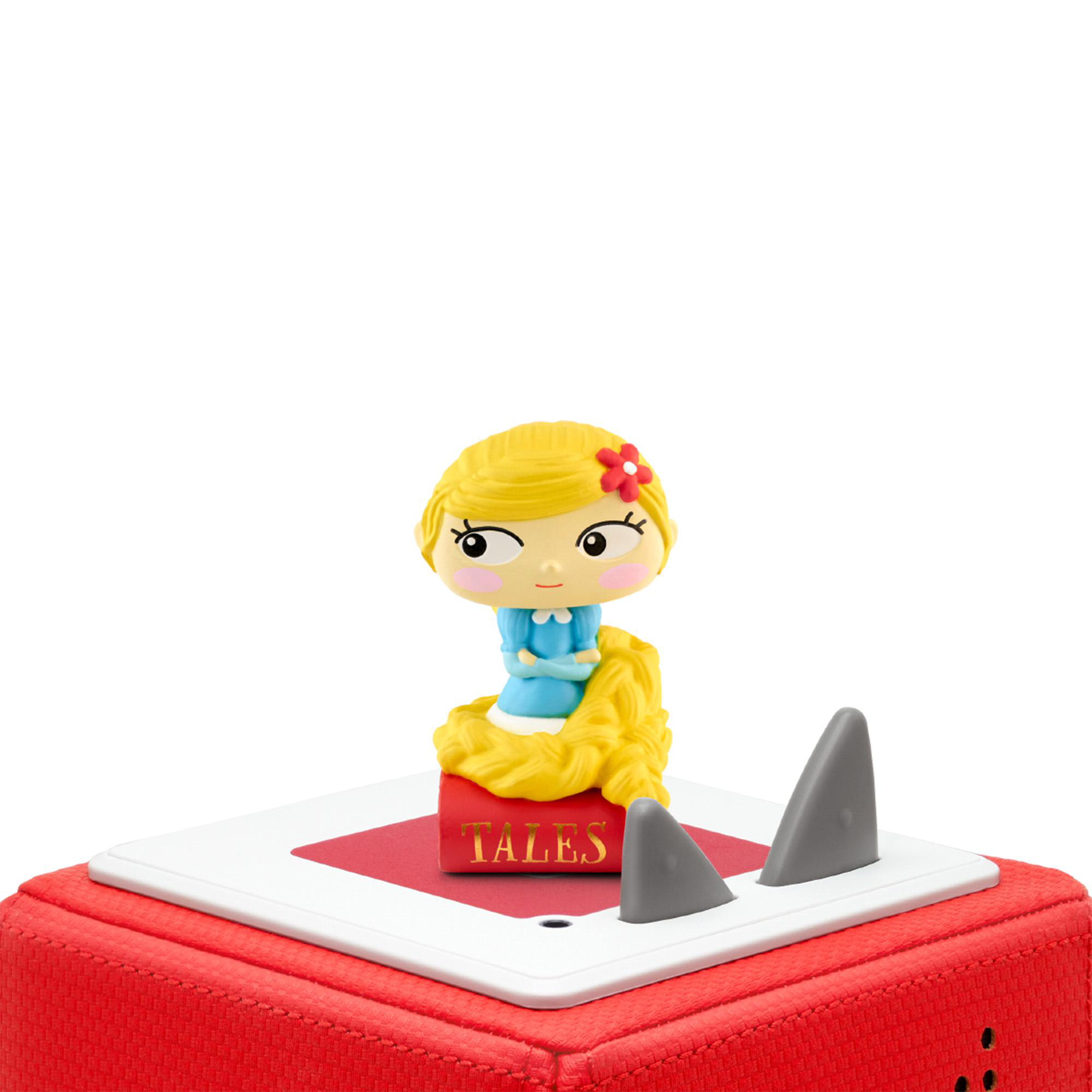 Spielfigur eines Mädchens mit einer roten Box mit der Aufschrift TALES, mit Haifischflossen-Ausschnitten.