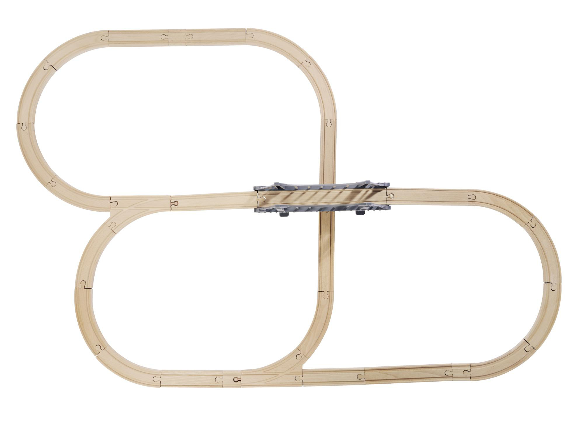 Holzspielzeug-Eisenbahnstrecke, die zwei verbundene Schleifen mit einer Brücke bildet.