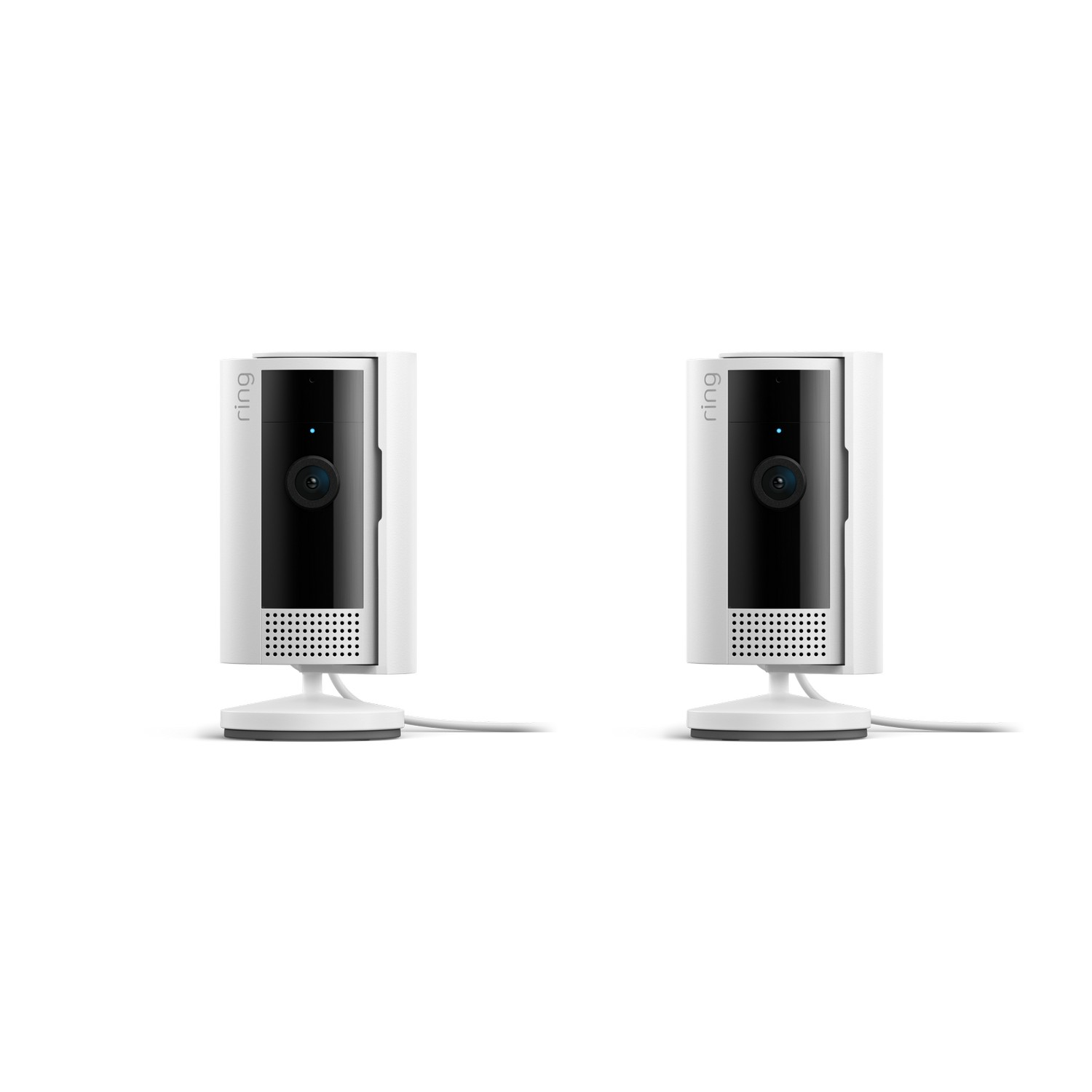 Deux caméras de sécurité Ring blanches sur une surface blanche. Elles ont un objectif noir et une petite base.