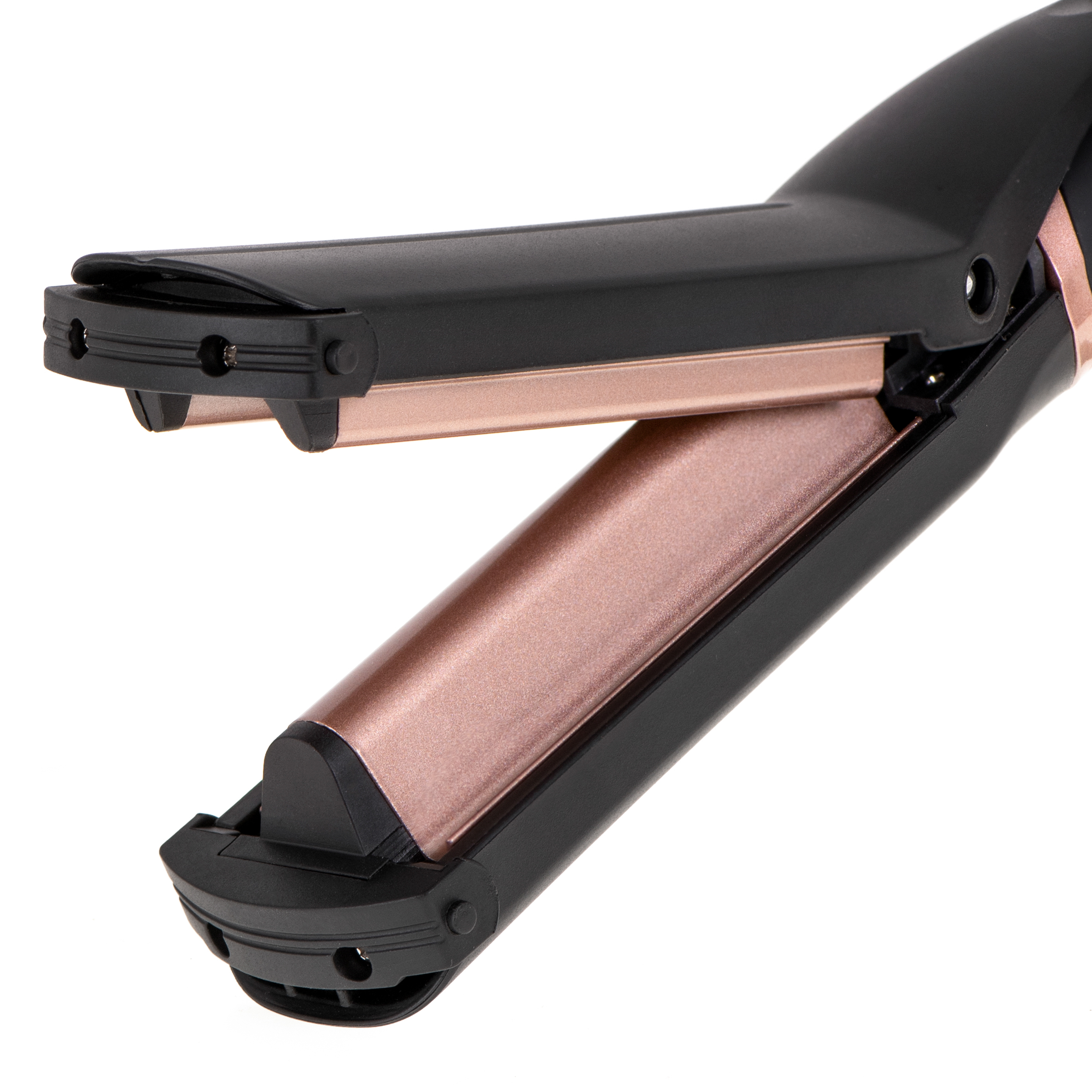 Közelkép egy fekete és rose gold hajformázóról, nyitva és használatra készen.