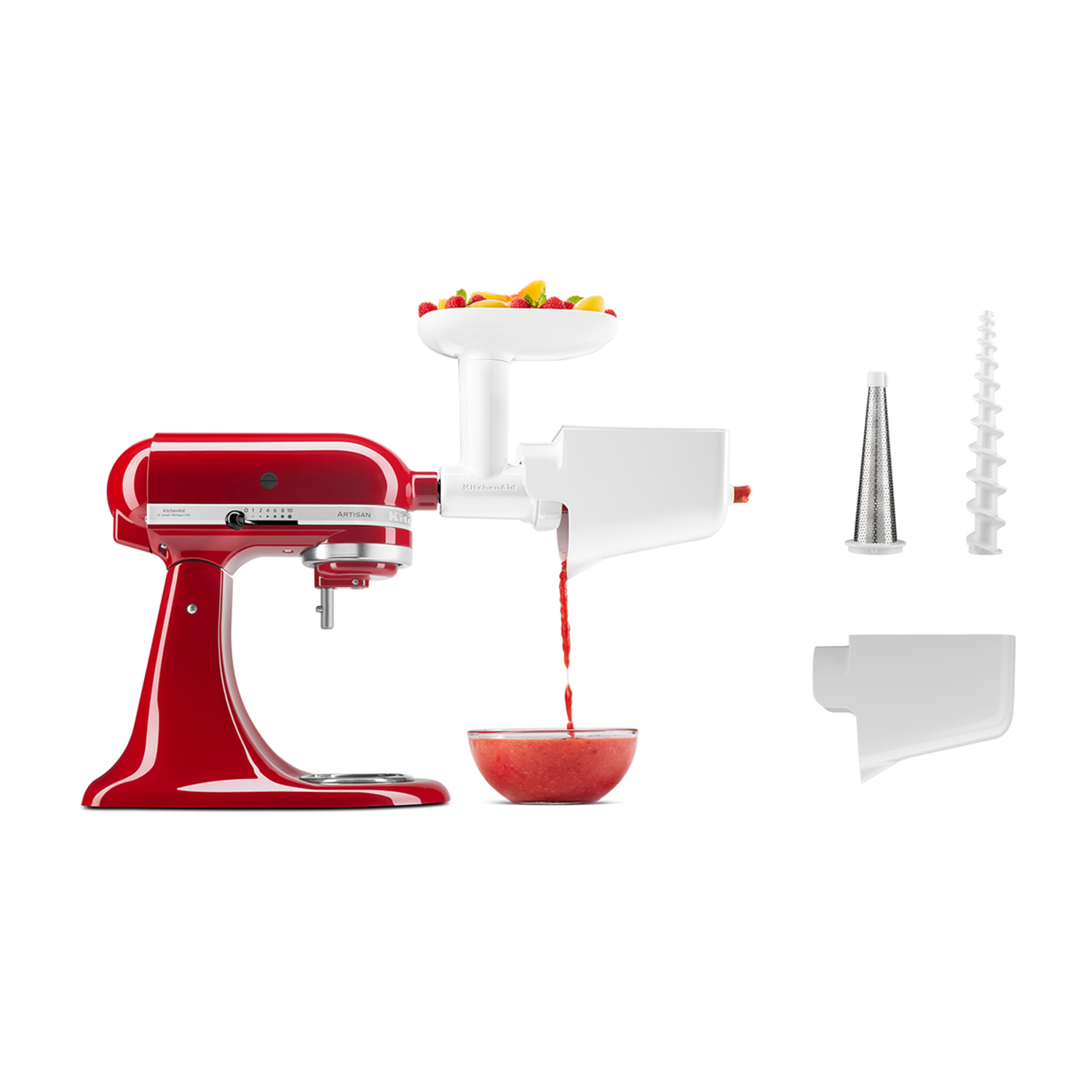 Frullatore KitchenAid rosso con accessorio spremiagrumi e accessori.