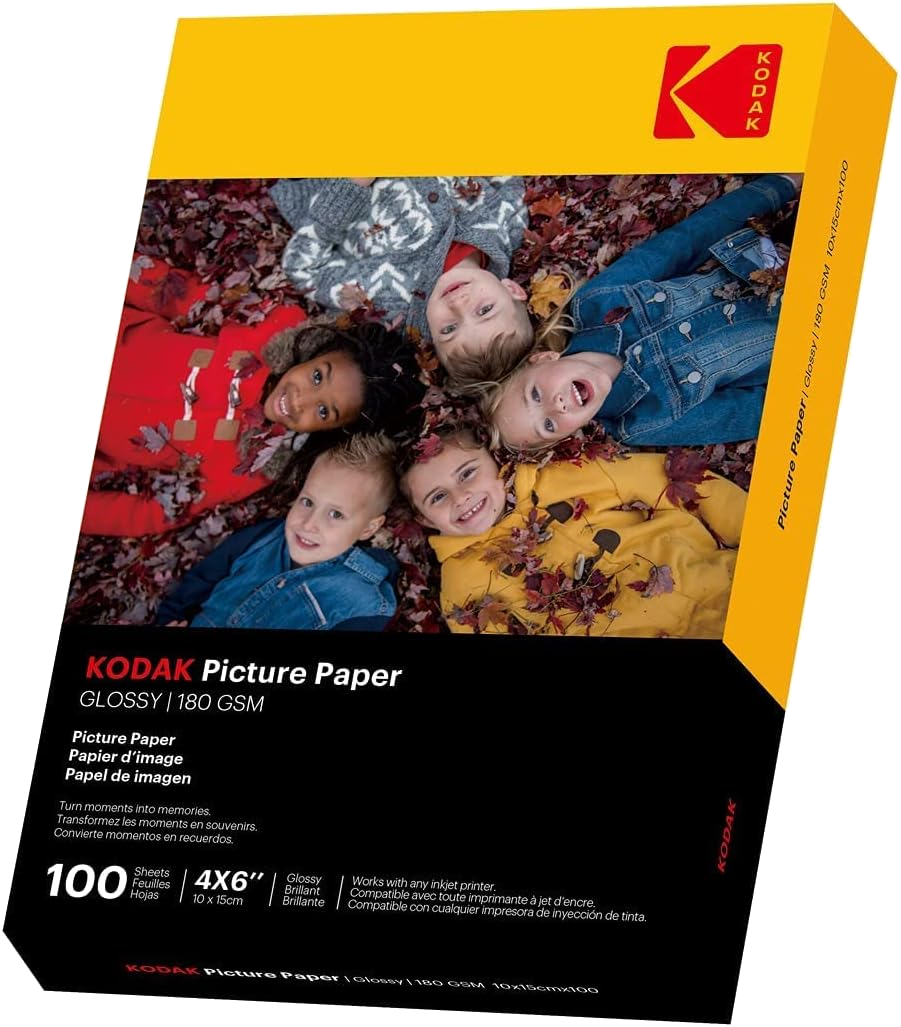 Kodak fotópapír doboz gyerekek arcával. A doboz sárga, piros és fekete felirattal.