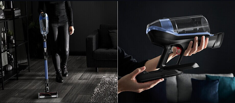 Osoba trzymająca odkurzacz w jednej ręce, a odkurzacz bezprzewodowy w drugiej.