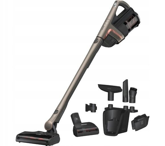 Bezprzewodowy odkurzacz z kilkoma przystawkami. Jest srebrny i czarny, na białym tle.