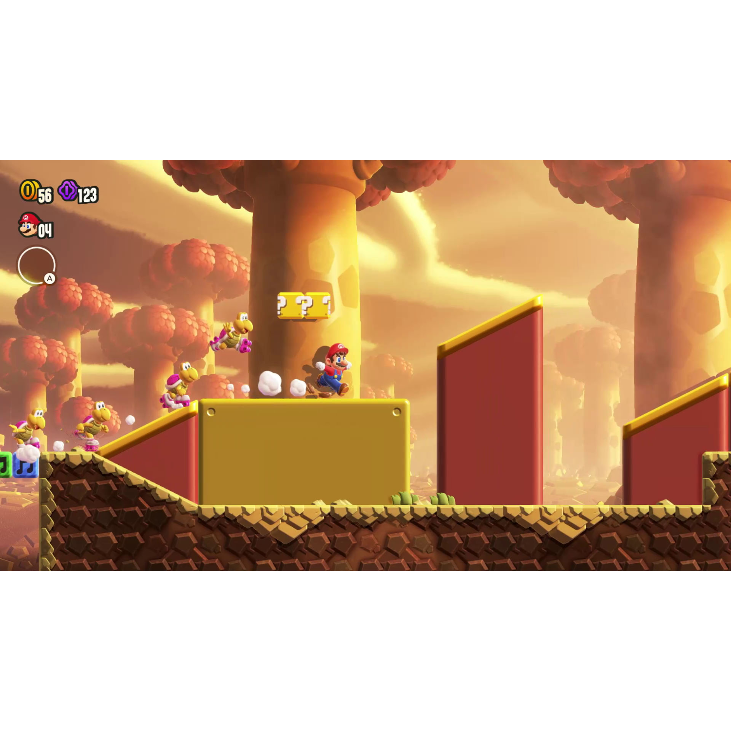 A Super Mario game scene. Mario running through a level with enemies and coins.