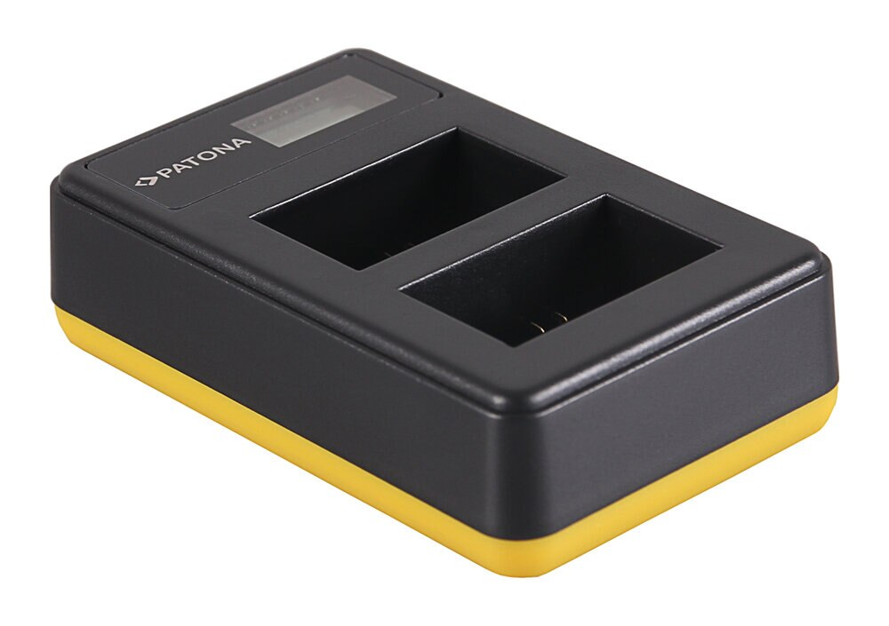 Czarna i żółta ładowarka do akumulatorów Patona z dwoma gniazdami i wyświetlaczem cyfrowym, białe tło.