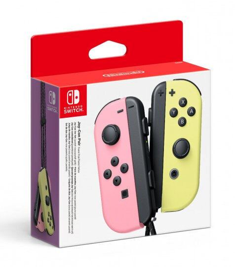 Pudełko Nintendo Switch Joy-Con z różowymi i żółtymi kontrolerami oraz fioletowym paskiem.