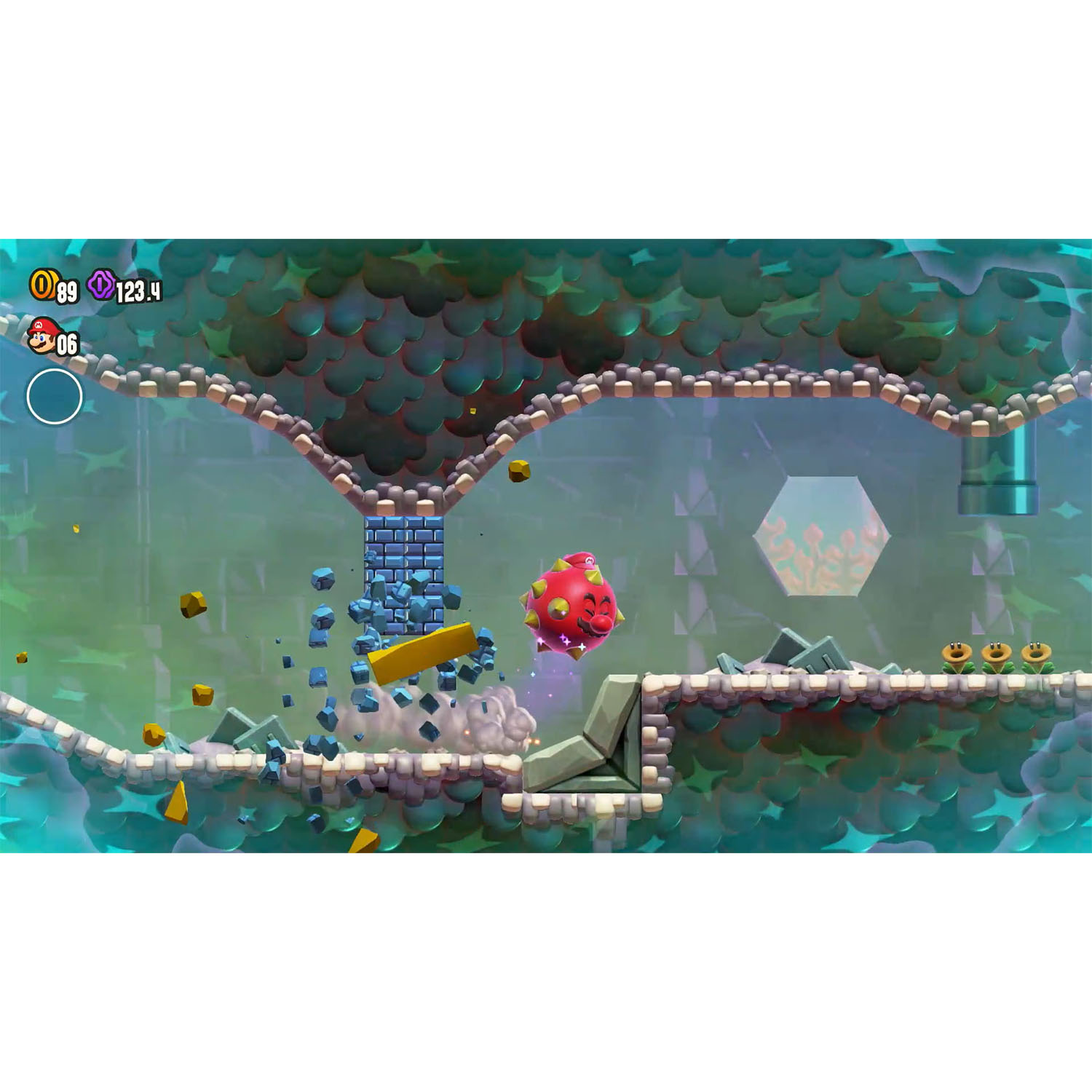 Una scena di videogioco con una palla rossa spinosa e un ambiente pixelato.