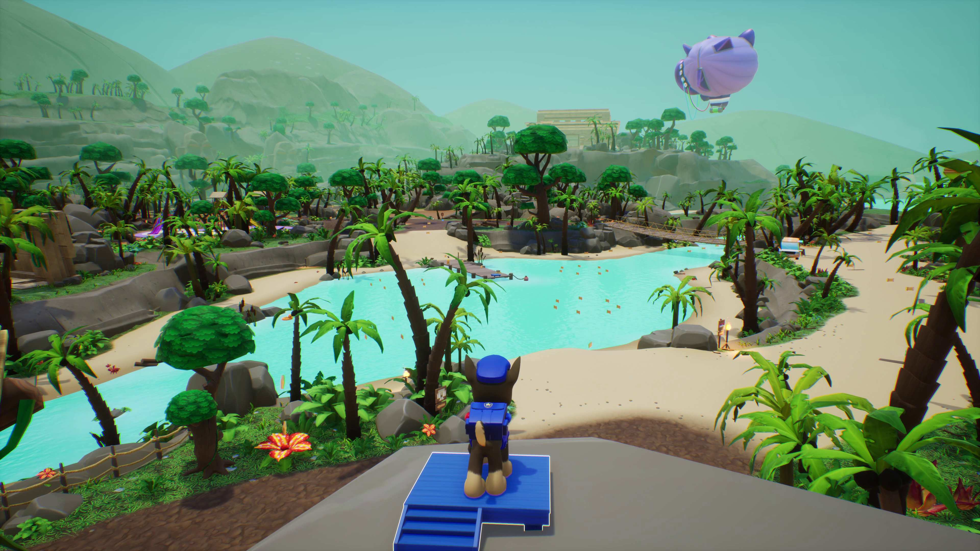 Paw Patrol Szene: Chase auf Plattform mit Blick auf tropische Landschaft und Zeppelin.