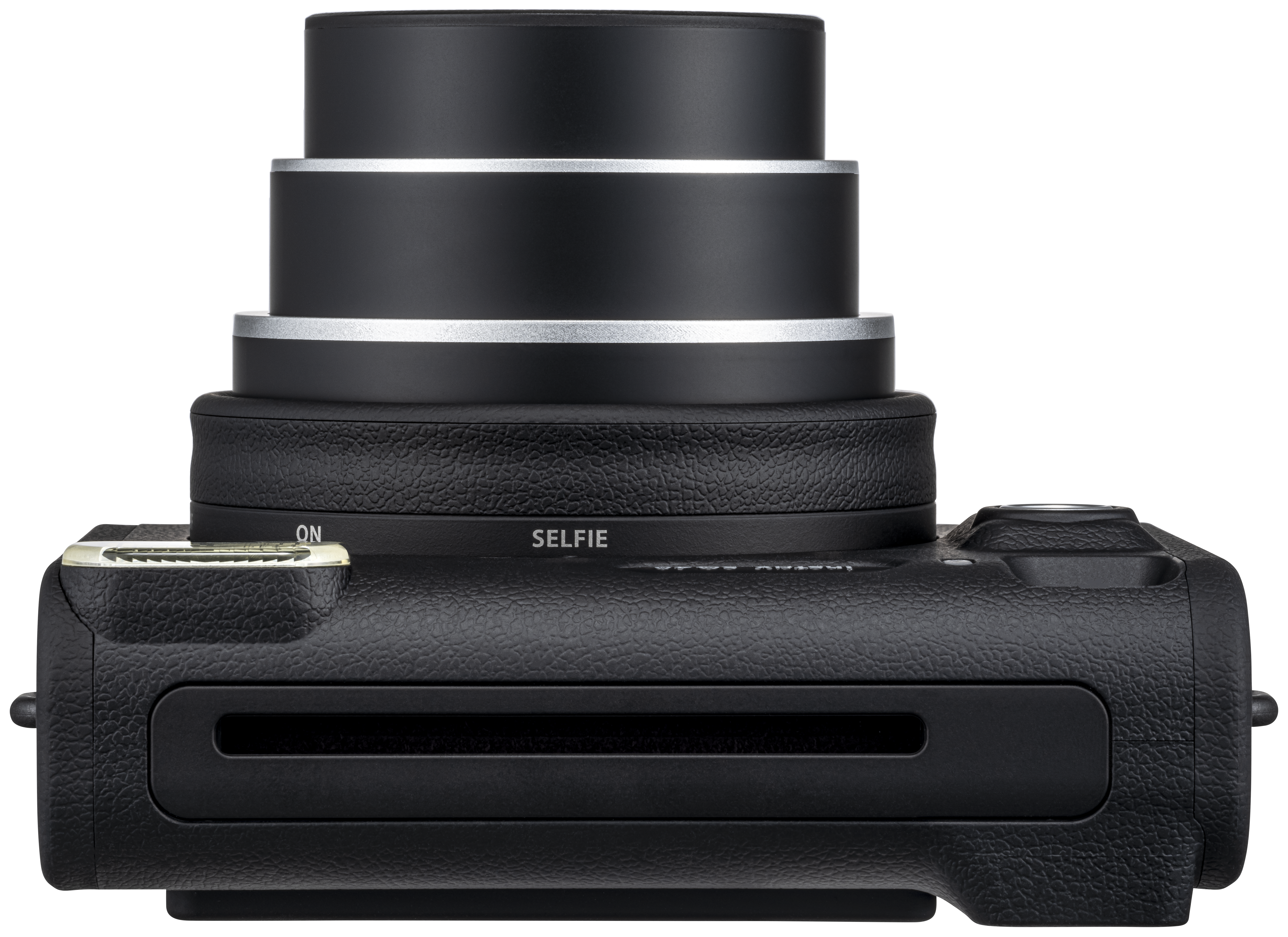 Eine schwarze Kamera wird von oben gezeigt. Die Kamera hat ein Objektiv und eine „ON“- und „SELFIE“-Taste.