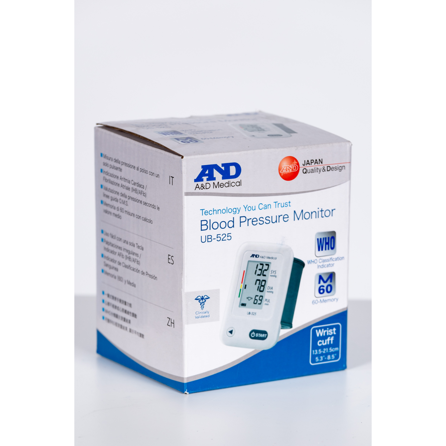 Een bloeddrukmonitor doos. De doos is wit en heeft een scherm en andere details.