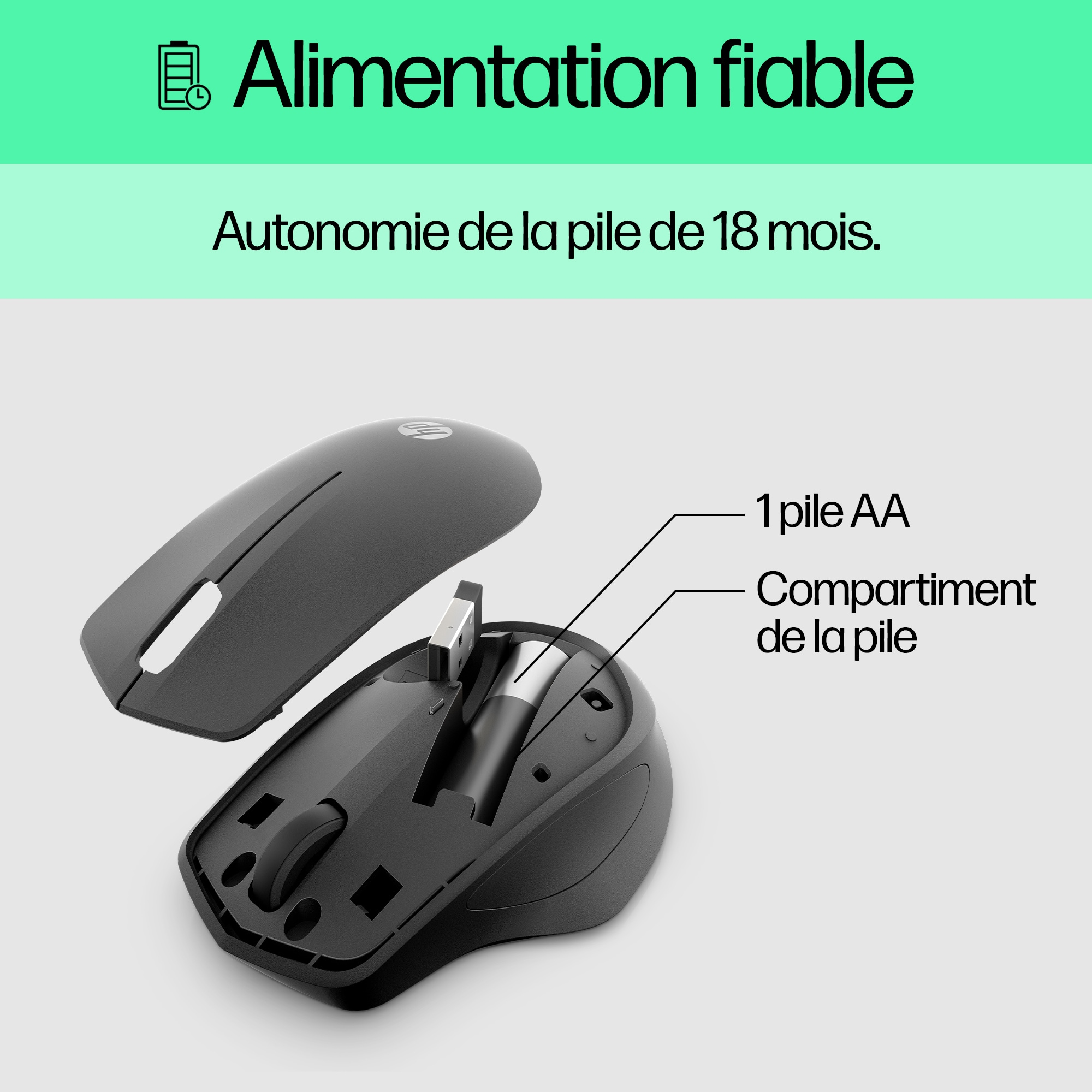 Mouse with a battery compartment open showing battery.