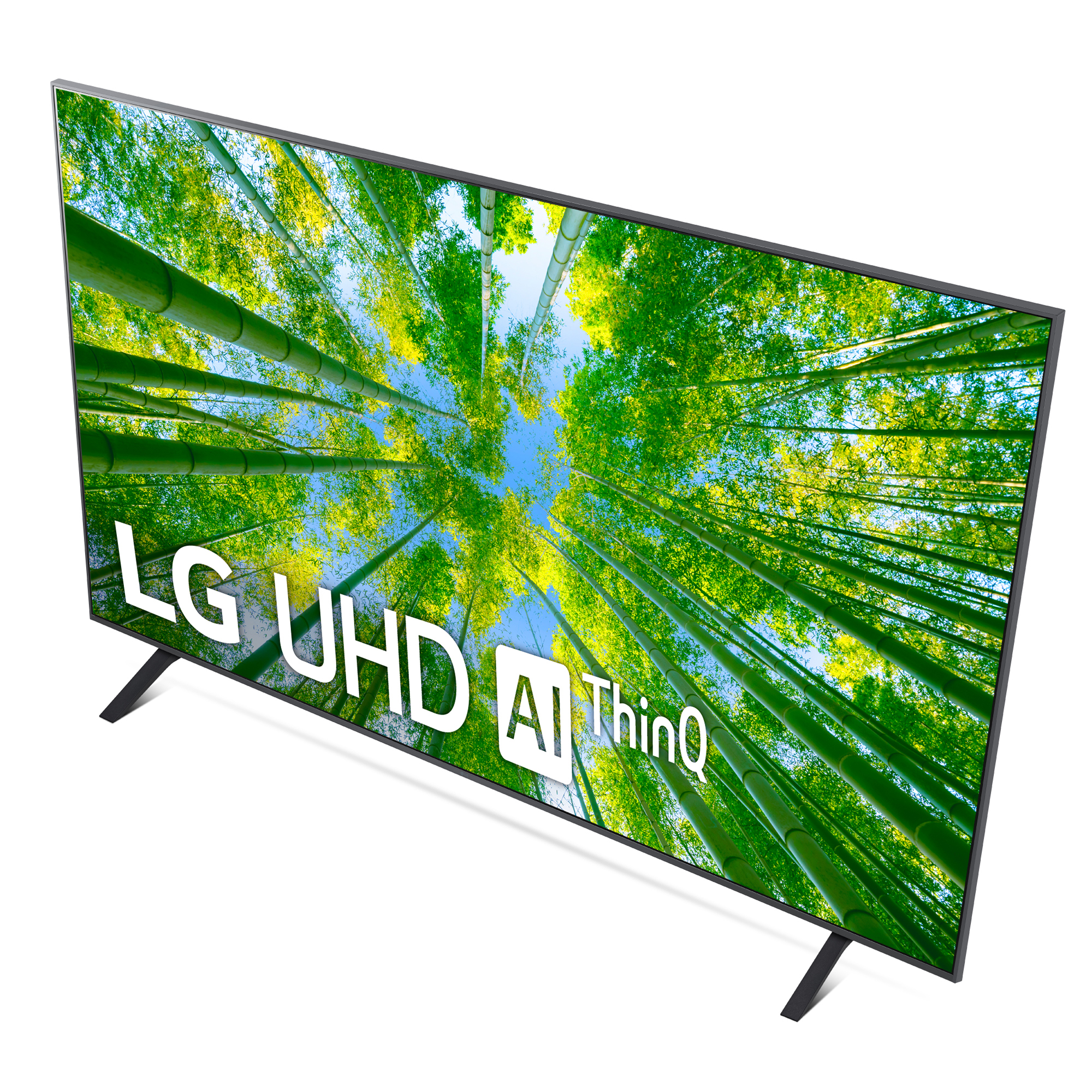 Televisor LG UHD grande que muestra una escena de bosque de bambú. Soporte negro, logotipo blanco.