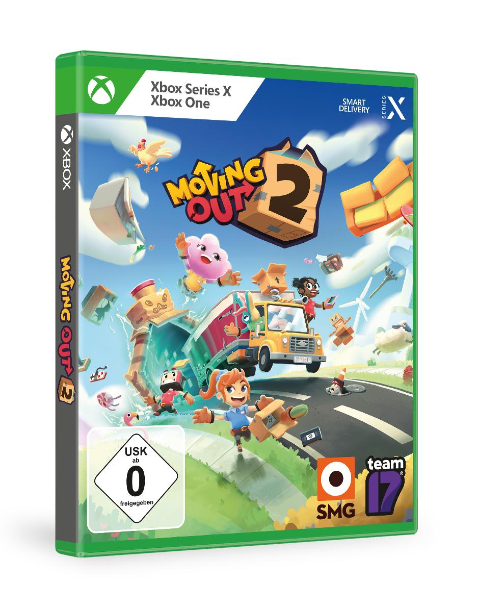 Spielbox. Ein Umzugswagen mit Figuren und einer Cartoon-Szene auf grünem Hintergrund.
