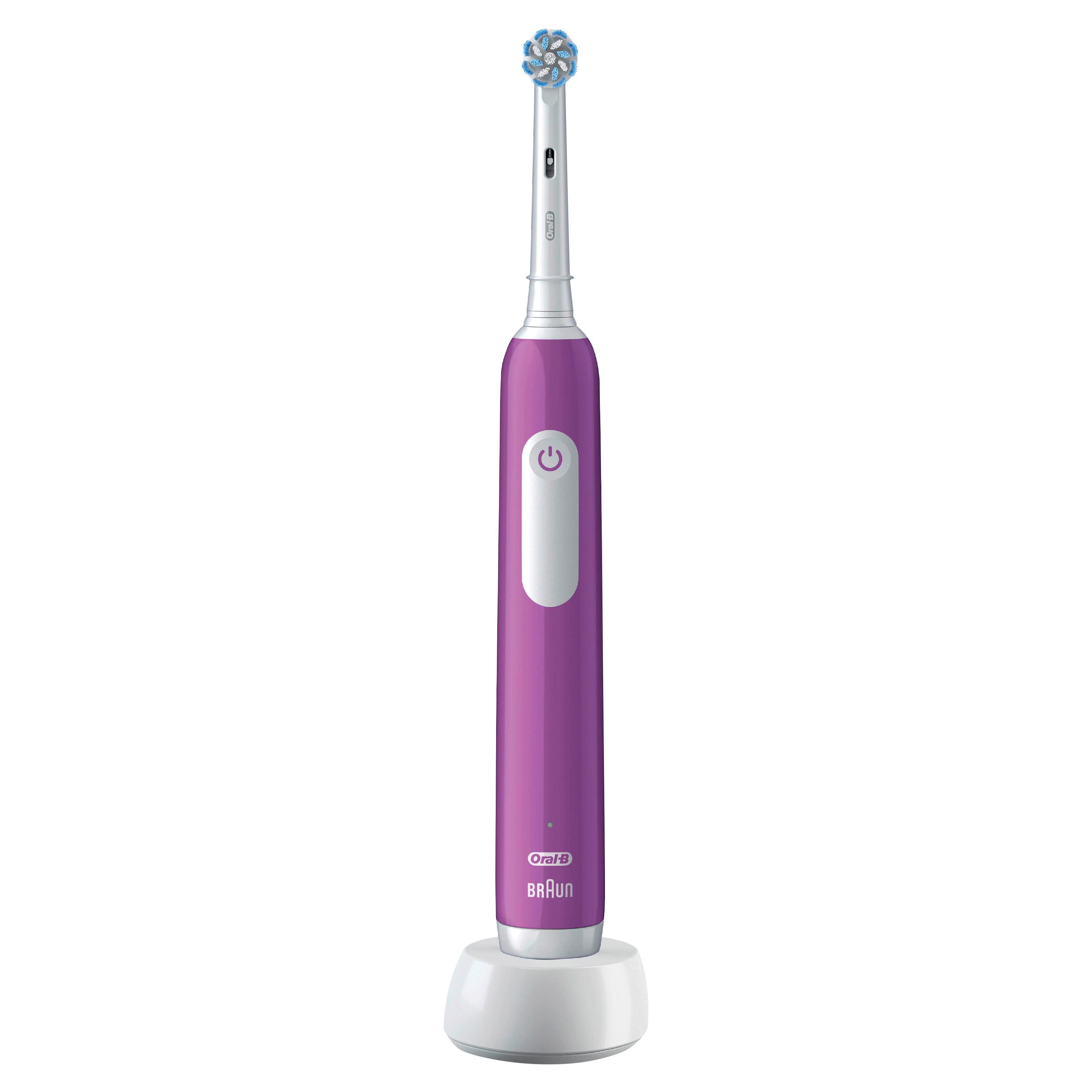 Lila elektrische Zahnbürste auf weißer Ladestation. Oral B und Braun sind sichtbar.