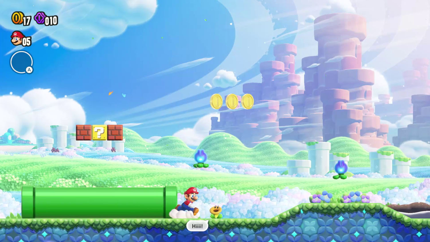 Mario rent op een wolk; munten zweven; groene pijp en vraagtekenblok.