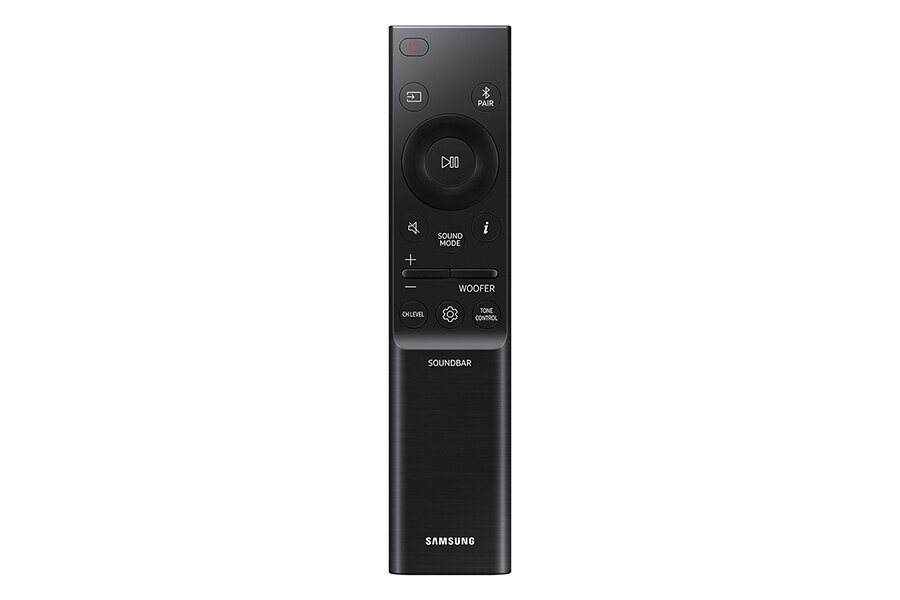 Czarny pilot do soundbaru Samsung, wyposażony w centralny przycisk odtwarzania/pauzy i regulację głośności.