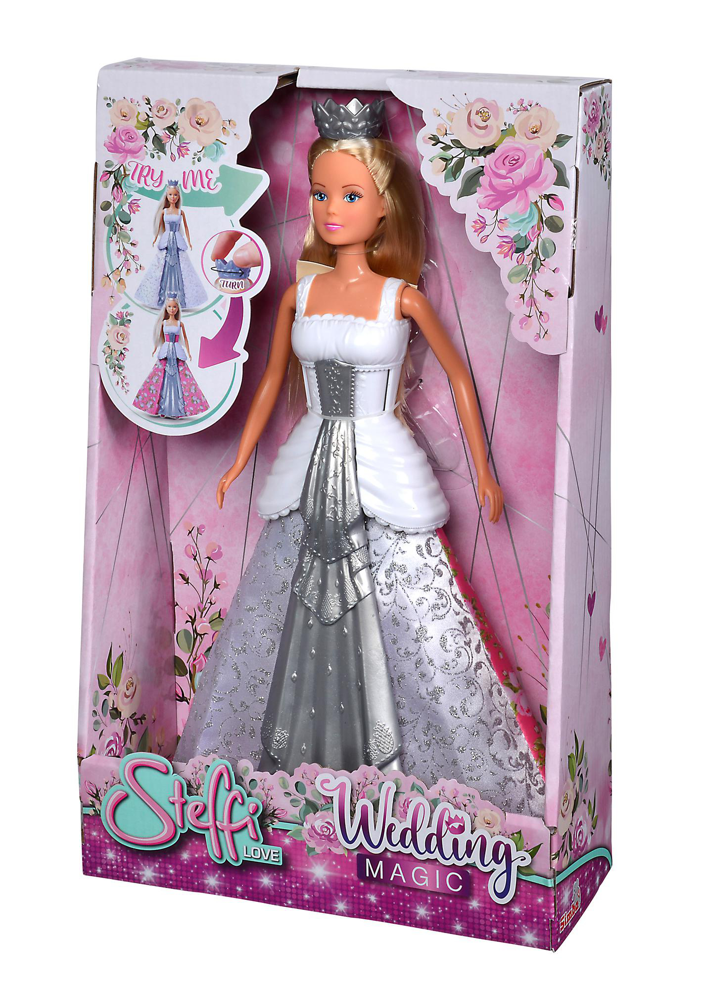 Eine Puppe in einem Brautkleid wird in einer Schachtel ausgestellt. Die Puppe hat blondes Haar und eine Krone.